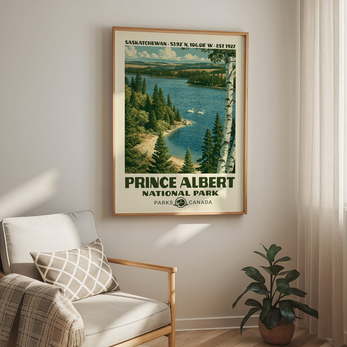 Prince Albert National Park print in an oak frame above a cream armchair and a rubber plant