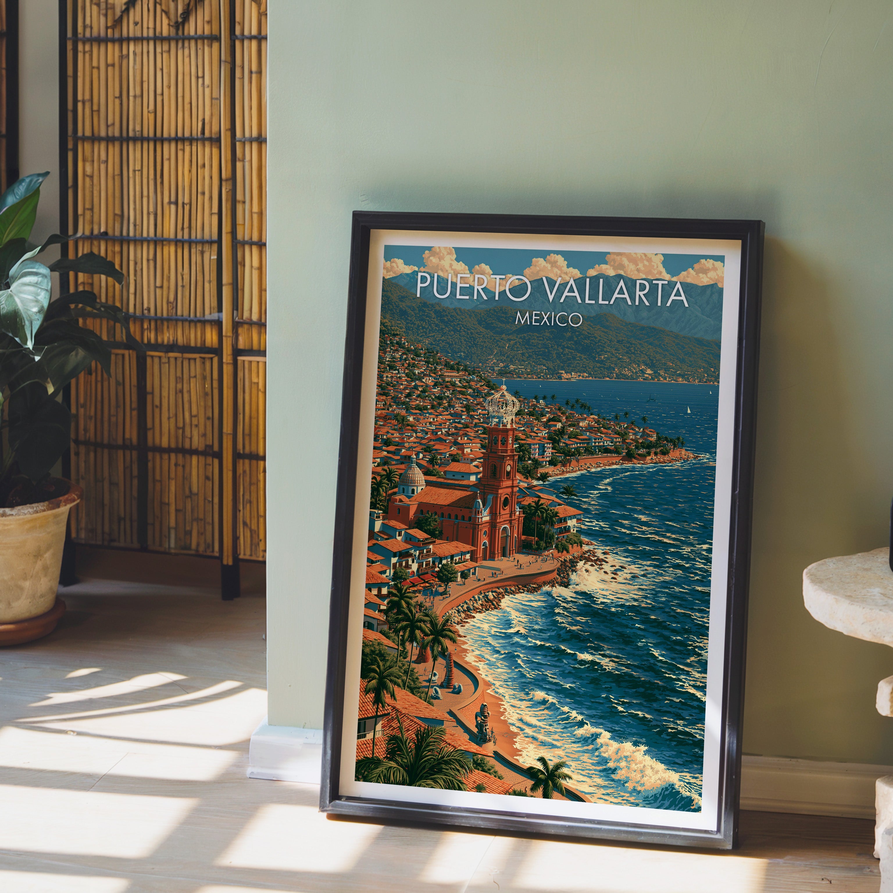 Rust and teal coastline, black frame leaning on pale wood floor by a sage wall and bamboo screen