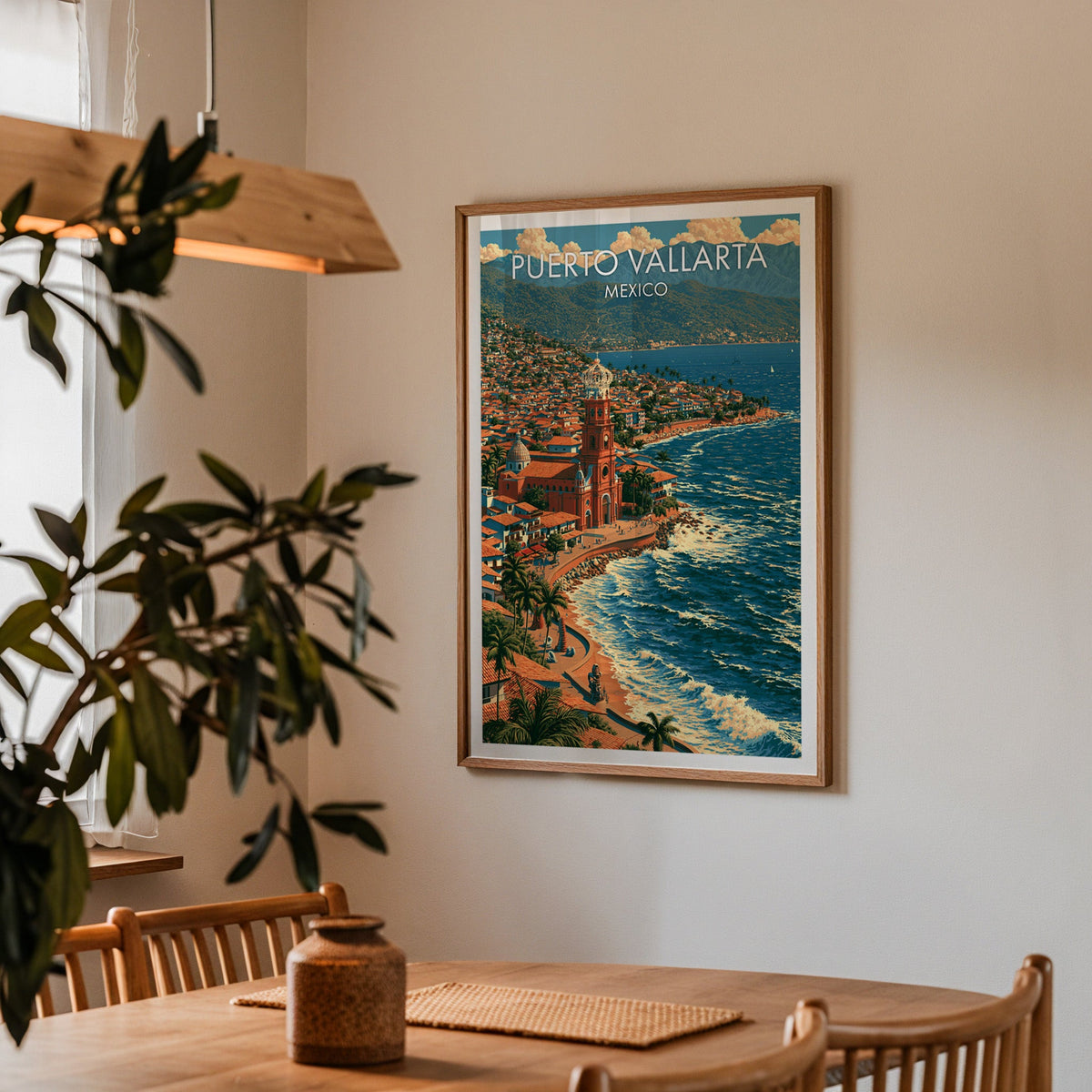 Pacific coast town poster in an oak frame in a dining corner with oak table and spindle chairs