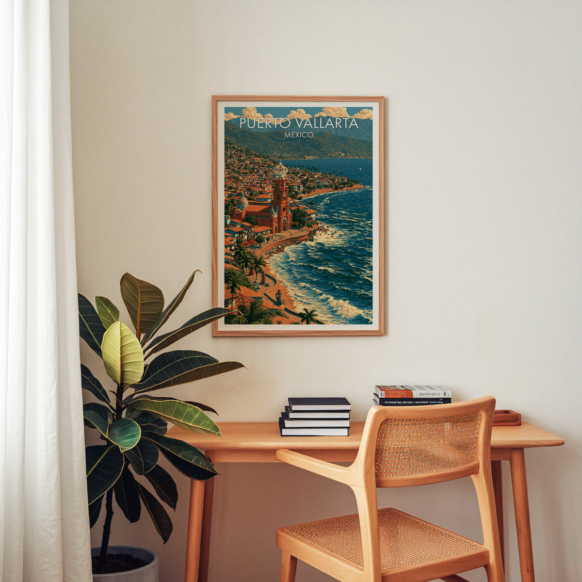 Hillside houses and headland, oak frame over a home-office desk with a cane chair and rubber plant