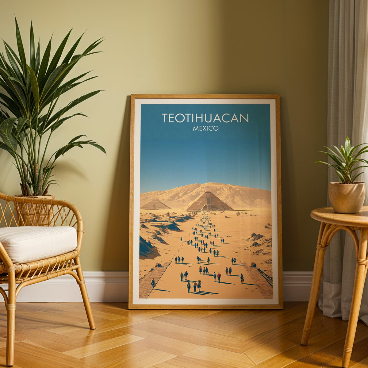 Aerial view of Teotihuacan in an oak frame on herringbone parquet with a rattan chair and cane side table