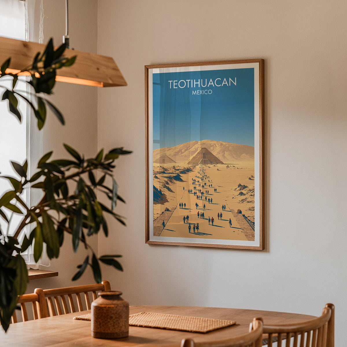 Stepped pyramid and hill ridge in an oak frame in a dining corner with oak table and pendant lamp
