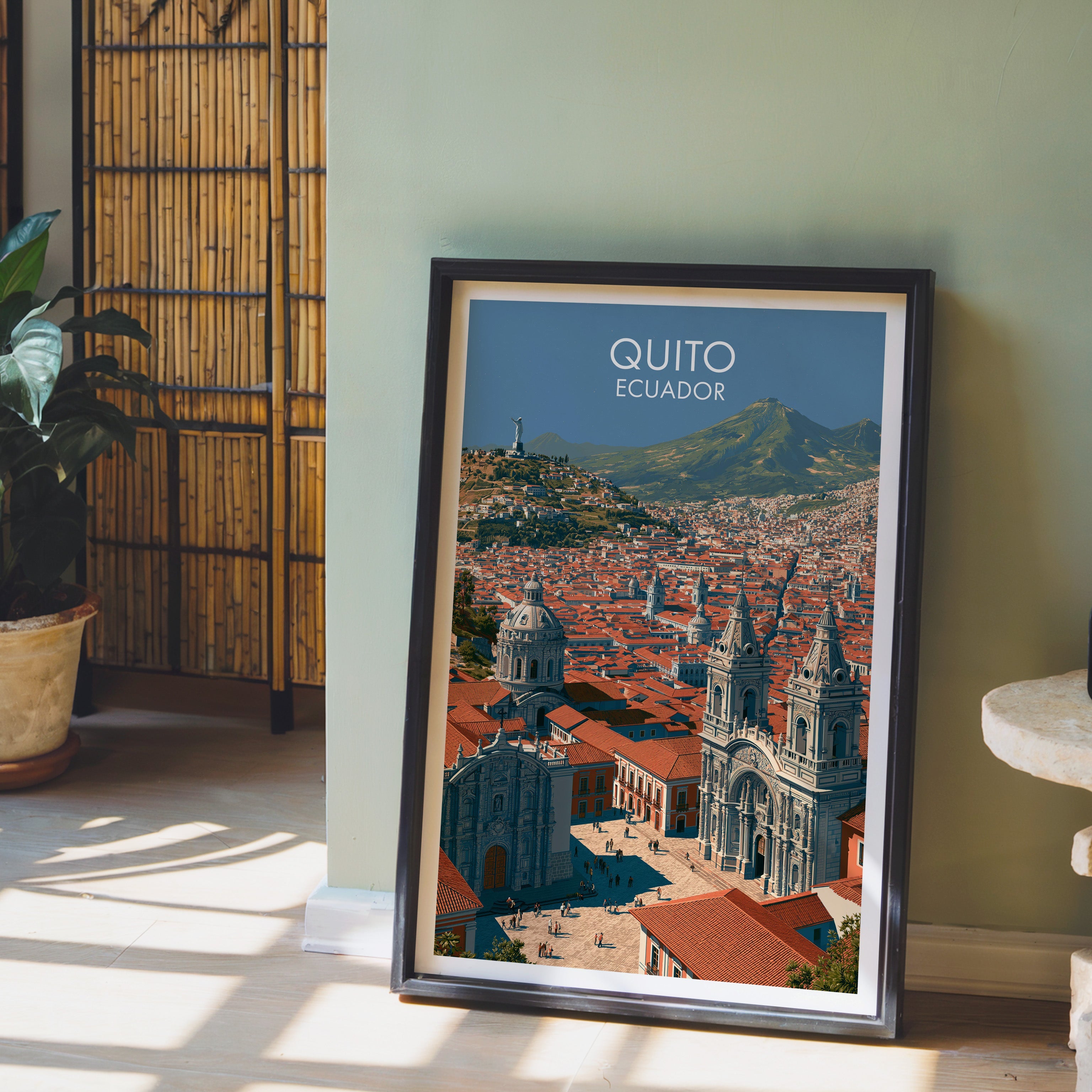 Historic centre art in a dark brown frame on pale wood flooring by a sage green wall, bamboo screen and clay pot