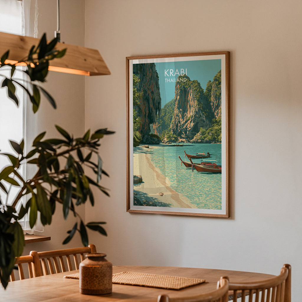 Framed Railay Beach Krabi Thailand print on a dining room wall above an oak table in warm afternoon light