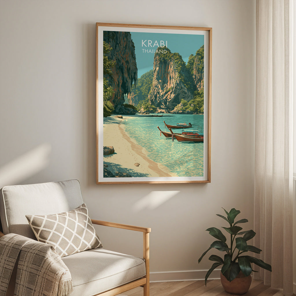 Railay Beach Krabi Thailand travel print in a light oak frame on a living room wall beside a linen armchair