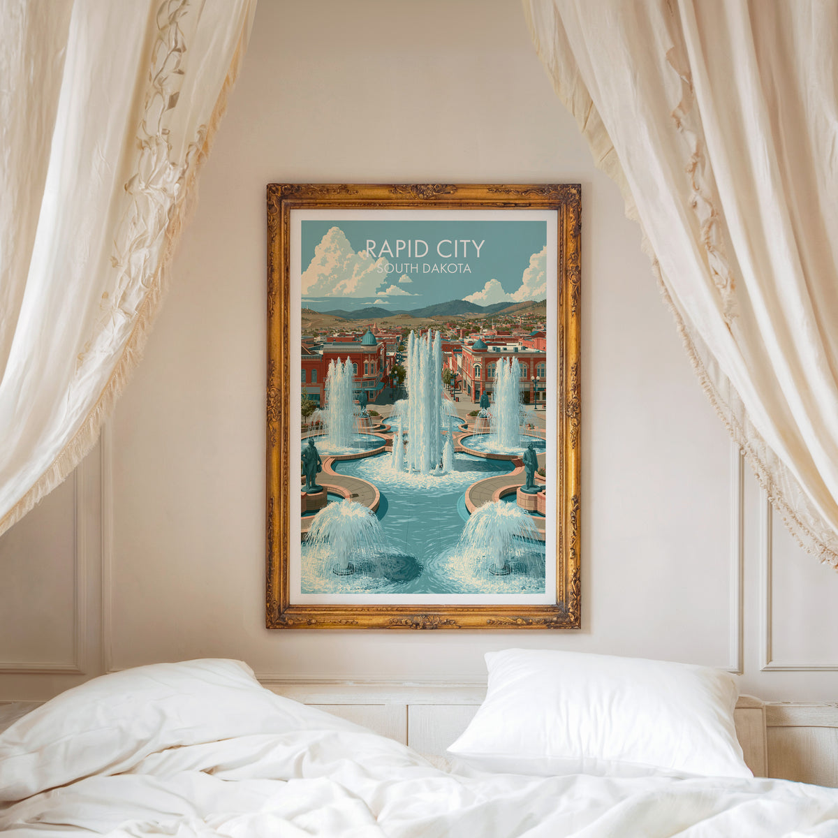 Rapid City travel art in a carved gold frame above a white bed with a linen canopy.