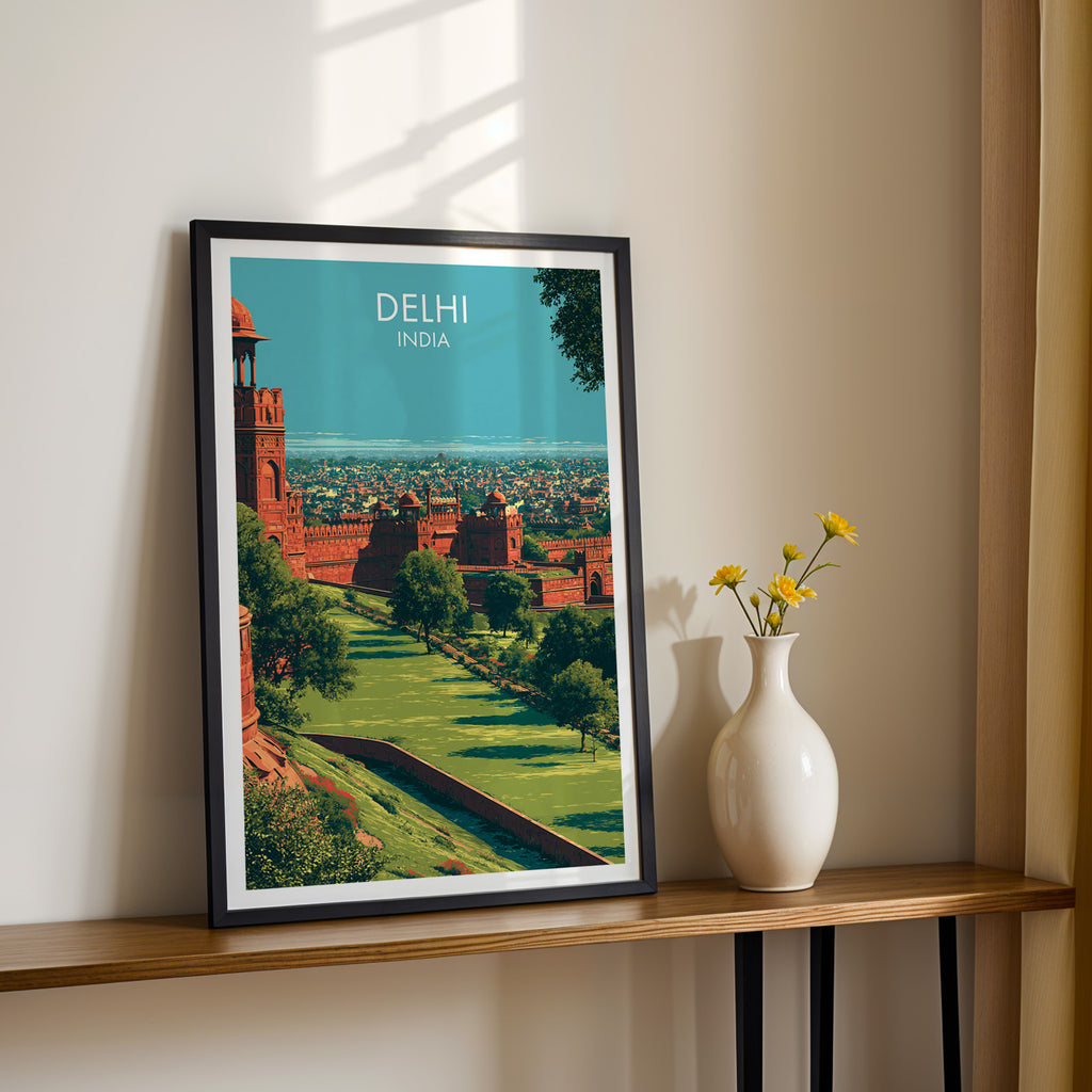 Black framed Red Fort Delhi India print on a narrow hallway console in sunlight, styled with yellow flowers