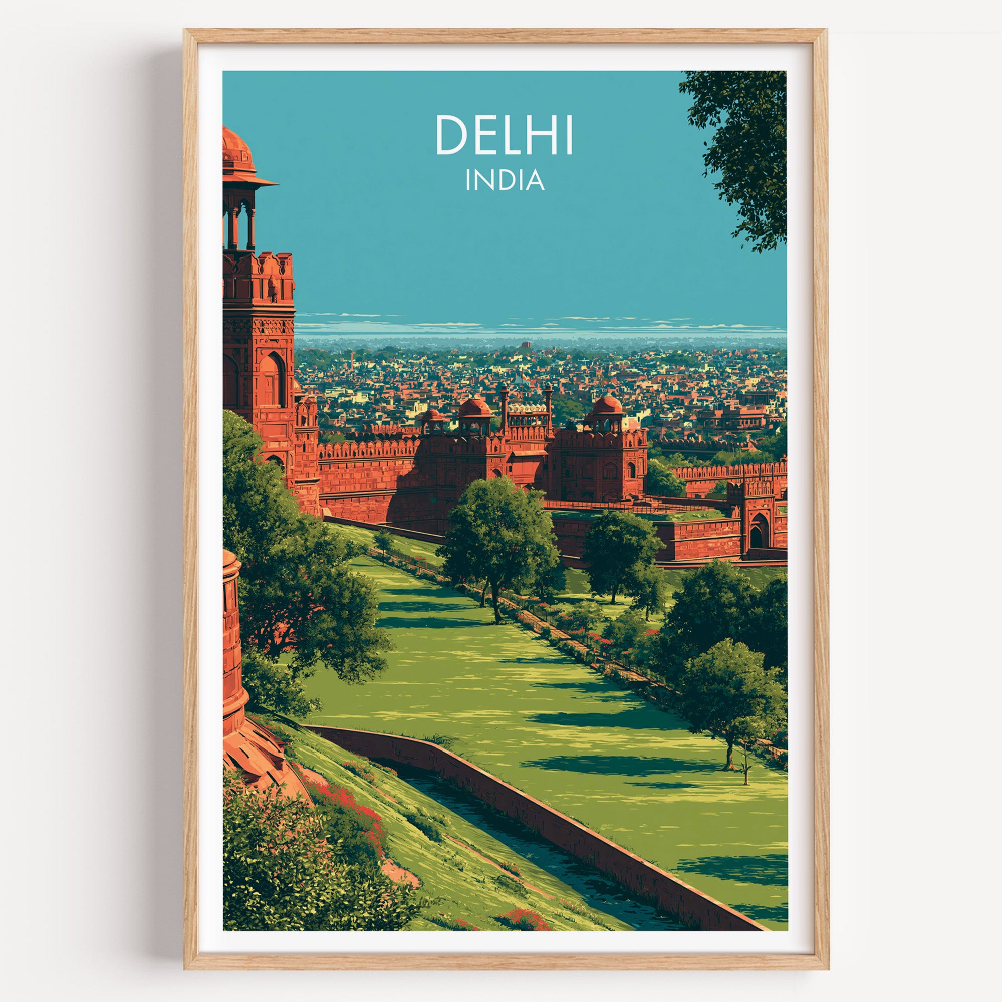 Red Fort Delhi India travel poster in a natural wood frame, shown against a clean white wall