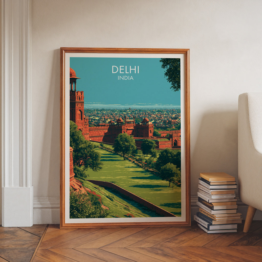 Red Fort Delhi India art print in a walnut frame leaning in a hallway beside stacked books
