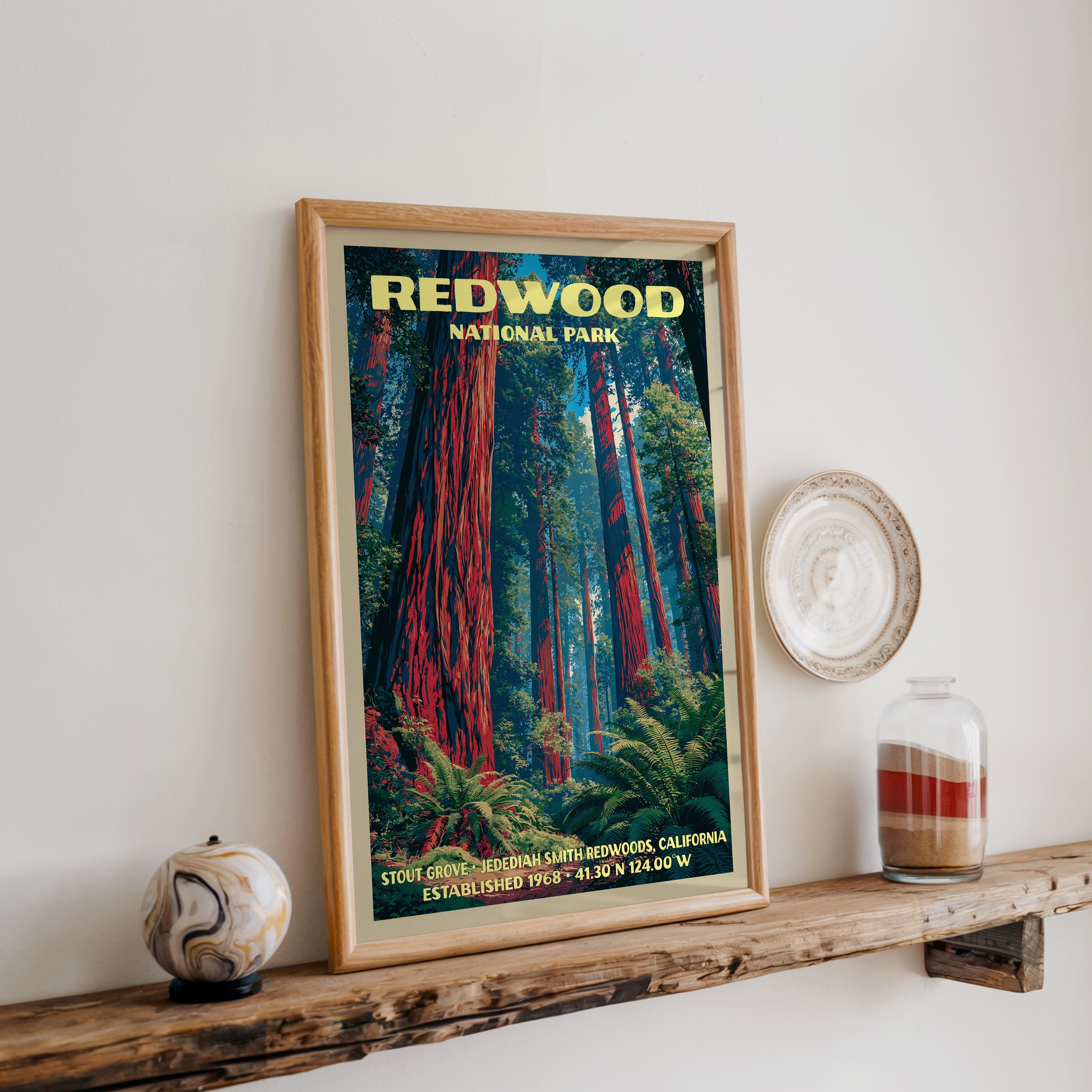 Redwood Stout Grove print in oak, leaning on a reclaimed wood ledge with a marbled sphere and sand jar