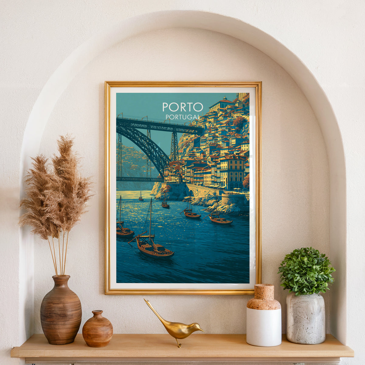 Porto Ribeira quay poster, gold frame in an arched wall niche above pampas grass in a clay vase