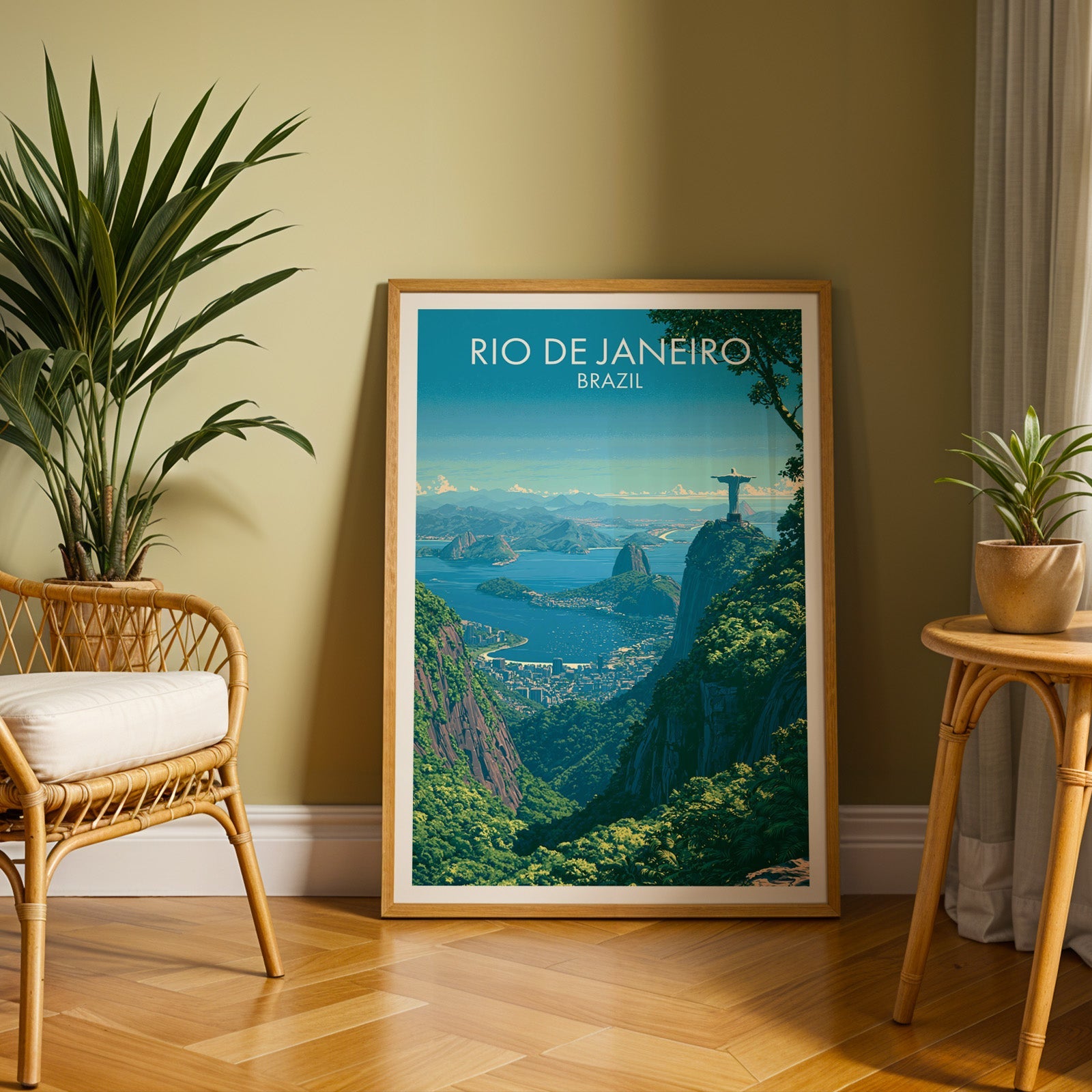 Rio jungle lookout art in an oak frame on a herringbone floor by an olive wall, rattan chair and tall palm