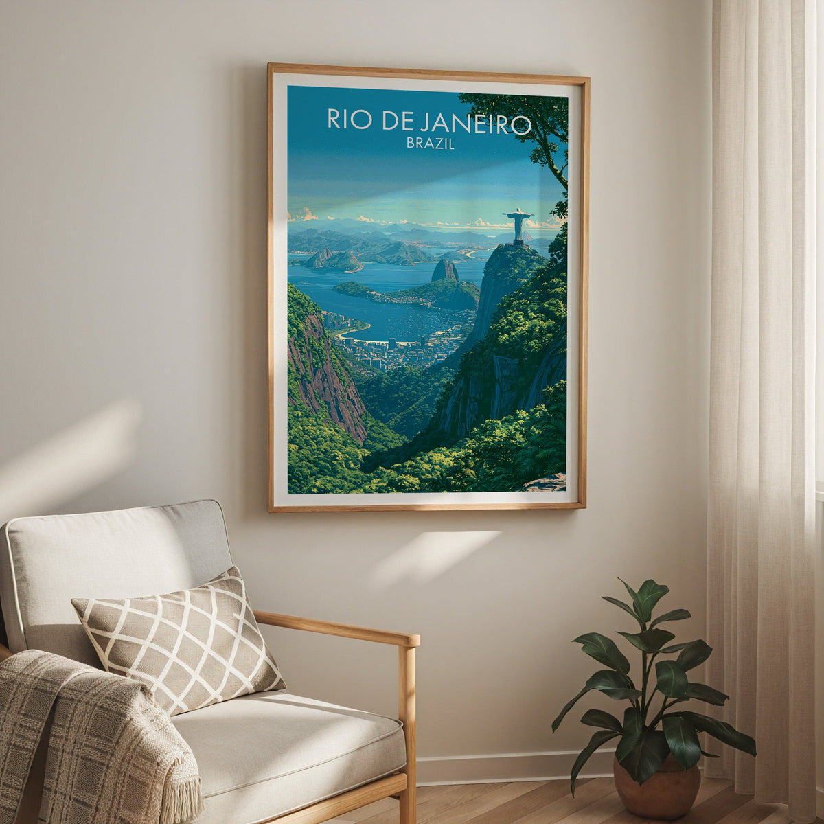 Rio rainforest ridge print in an oak frame above a cream armchair with a checked cushion and a rubber plant