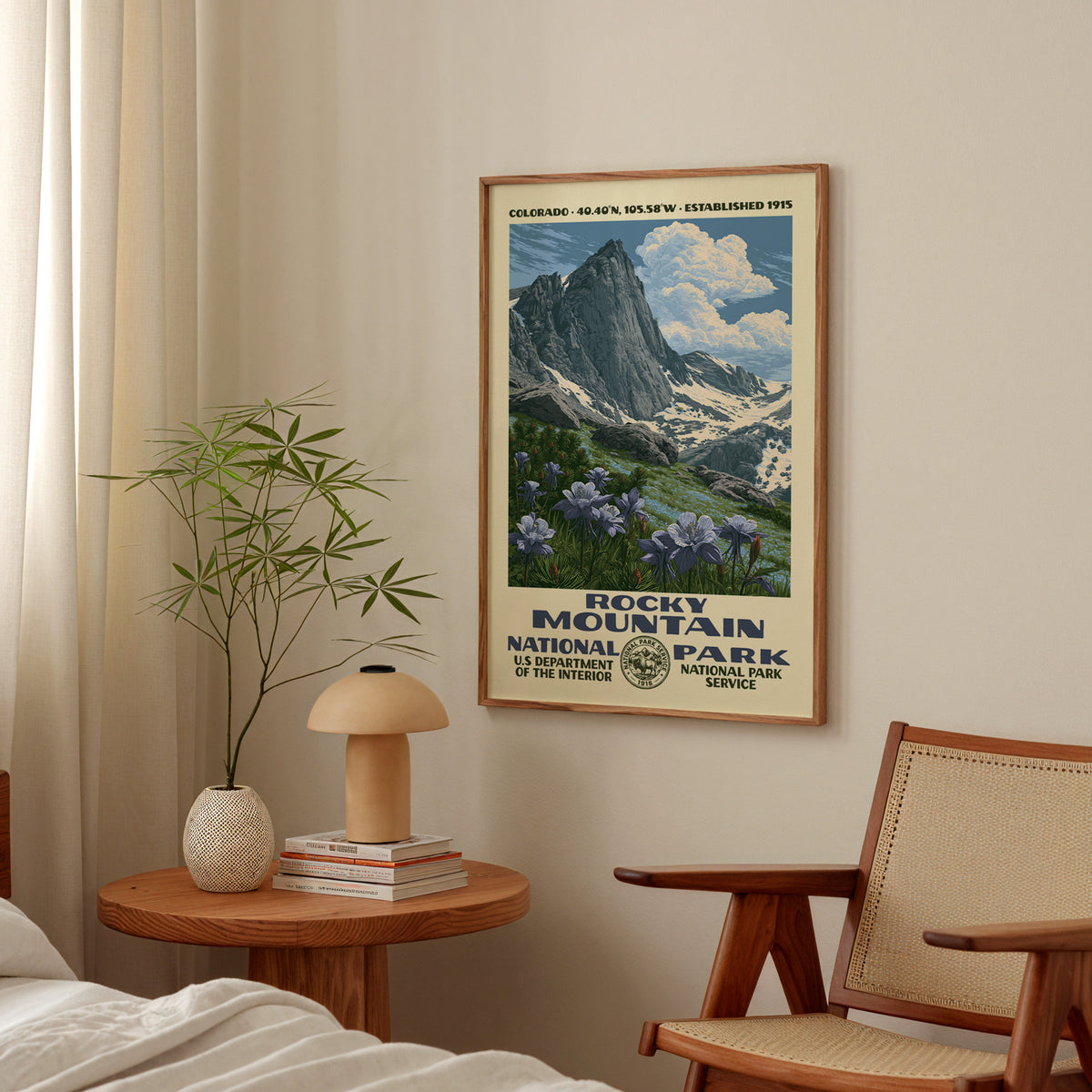 Rocky Mountain National Park vintage WPA print hanging above a side table in a calm bedroom corner