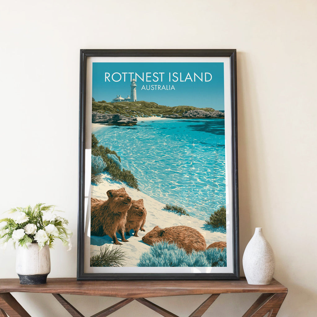 Quokka beach print in a black frame on a walnut console with white peonies and a tall ceramic vase