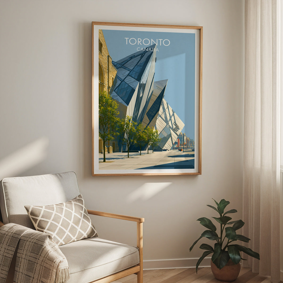 ROM Crystal Toronto print in an oak frame above a cream armchair and a rubber plant