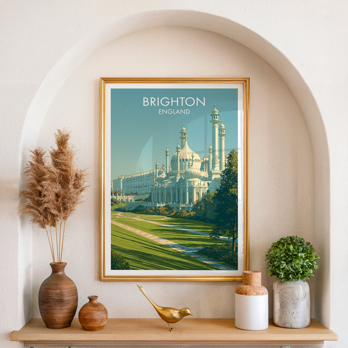 Brighton lawns poster, gold frame in an arched wall niche above pampas grass in a clay vase