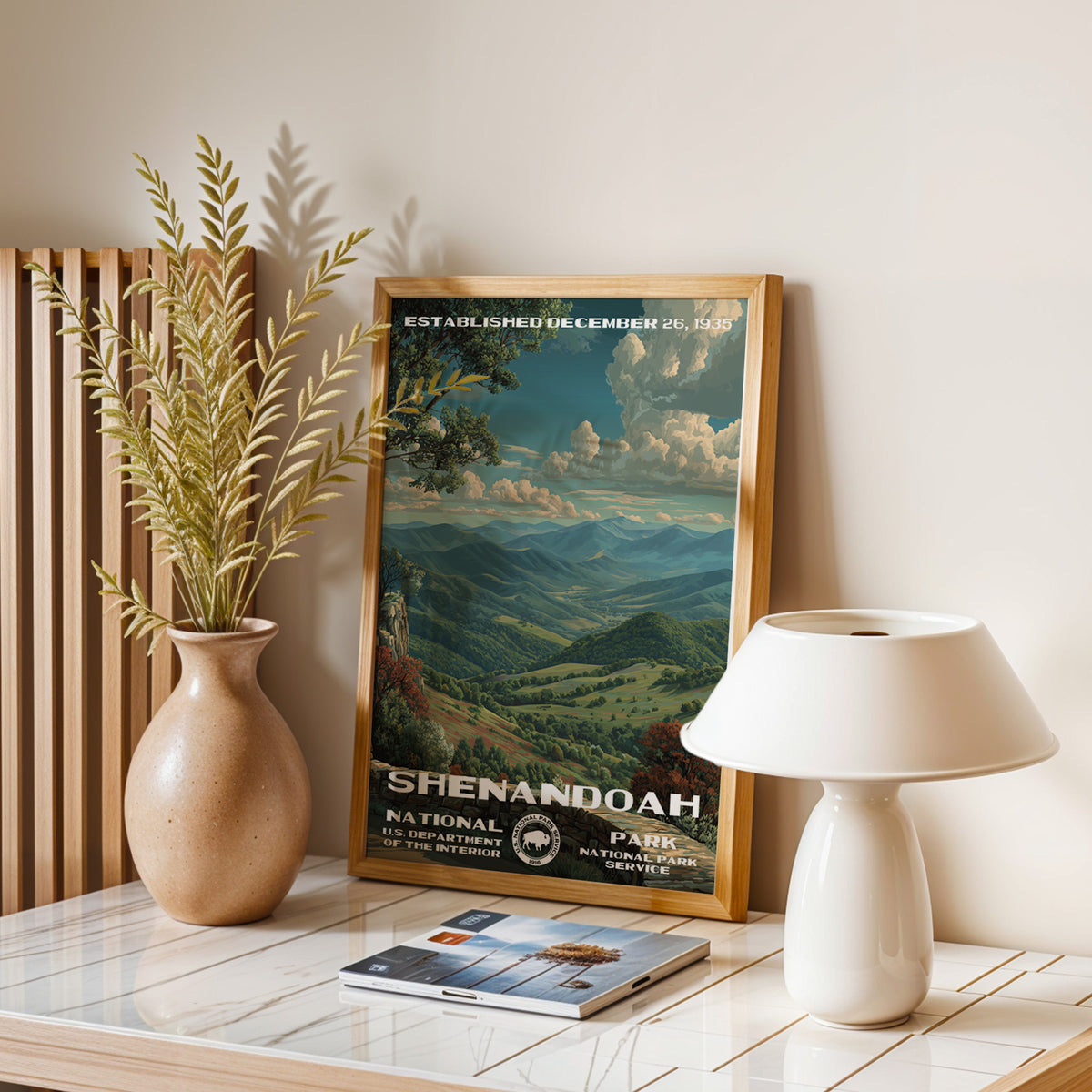 Shenandoah National Park vintage print leaning on a table with a ceramic lamp and dried grasses