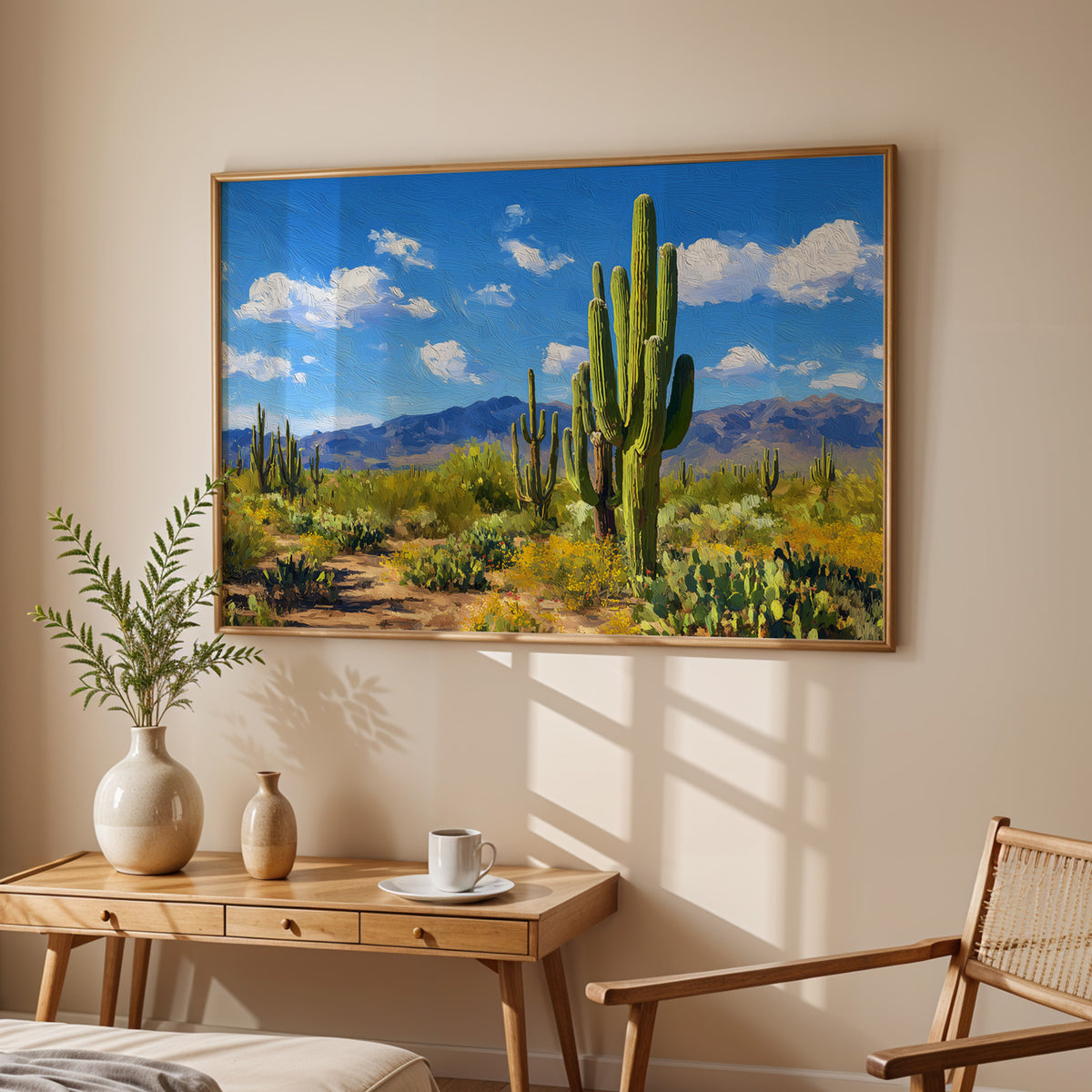 Saguaro National Park canvas print in a dark walnut frame above a cream sofa