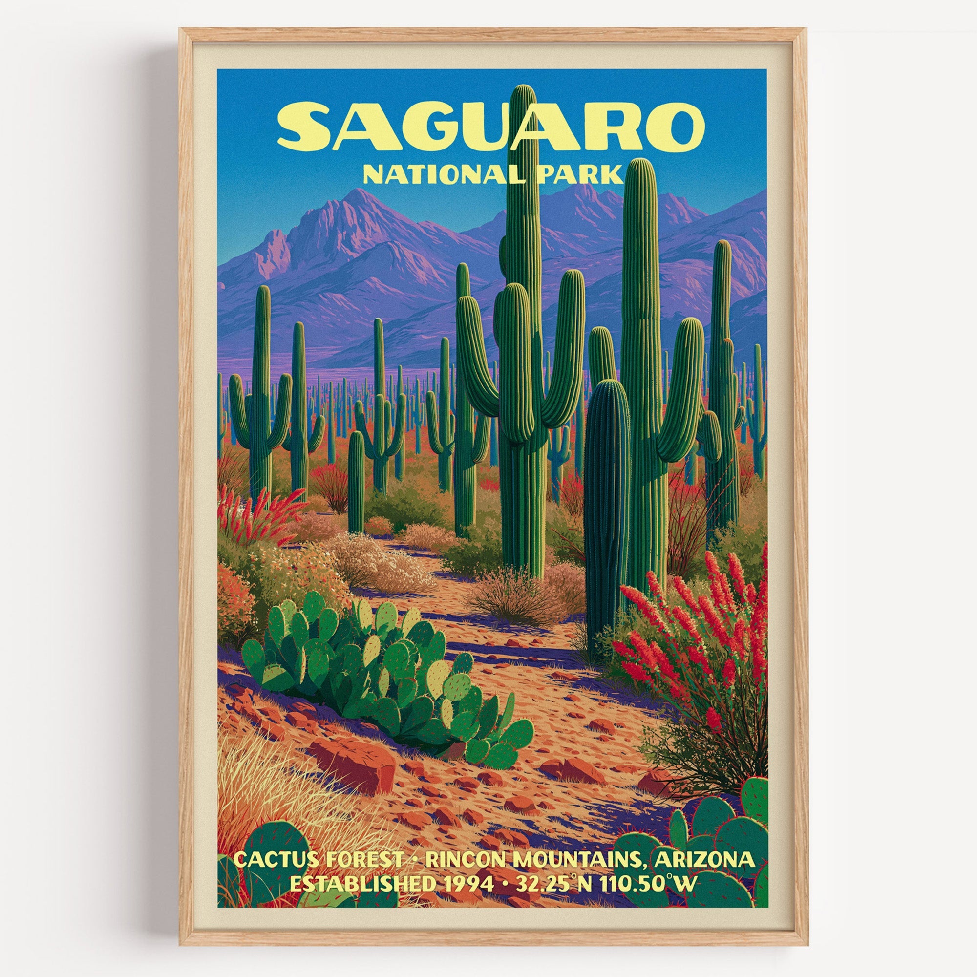 Cactus Forest Saguaro National Park vintage print in a light oak frame on a plain white wall