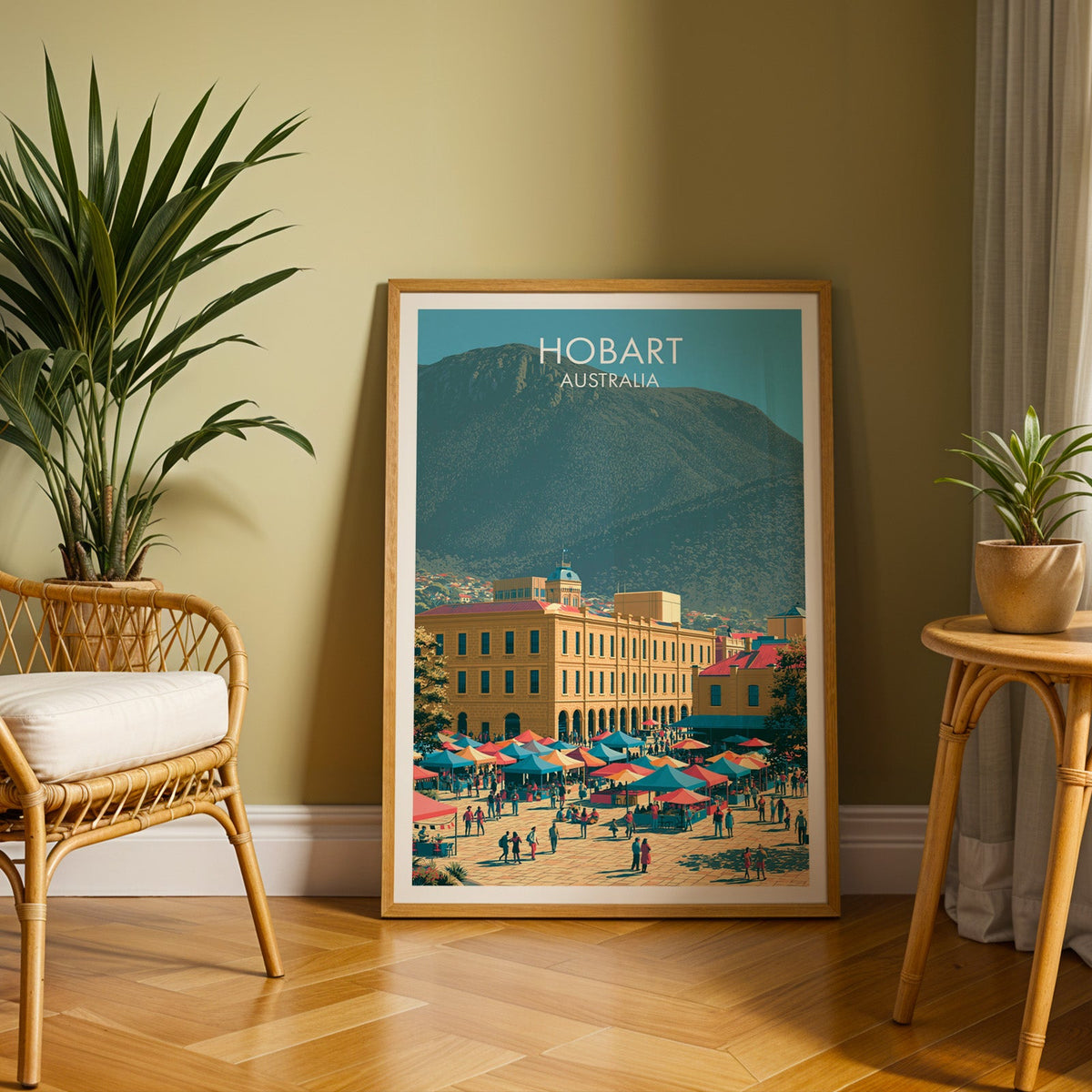 Sandstone warehouse poster in an oak frame on herringbone parquet with an olive wall and rattan chair