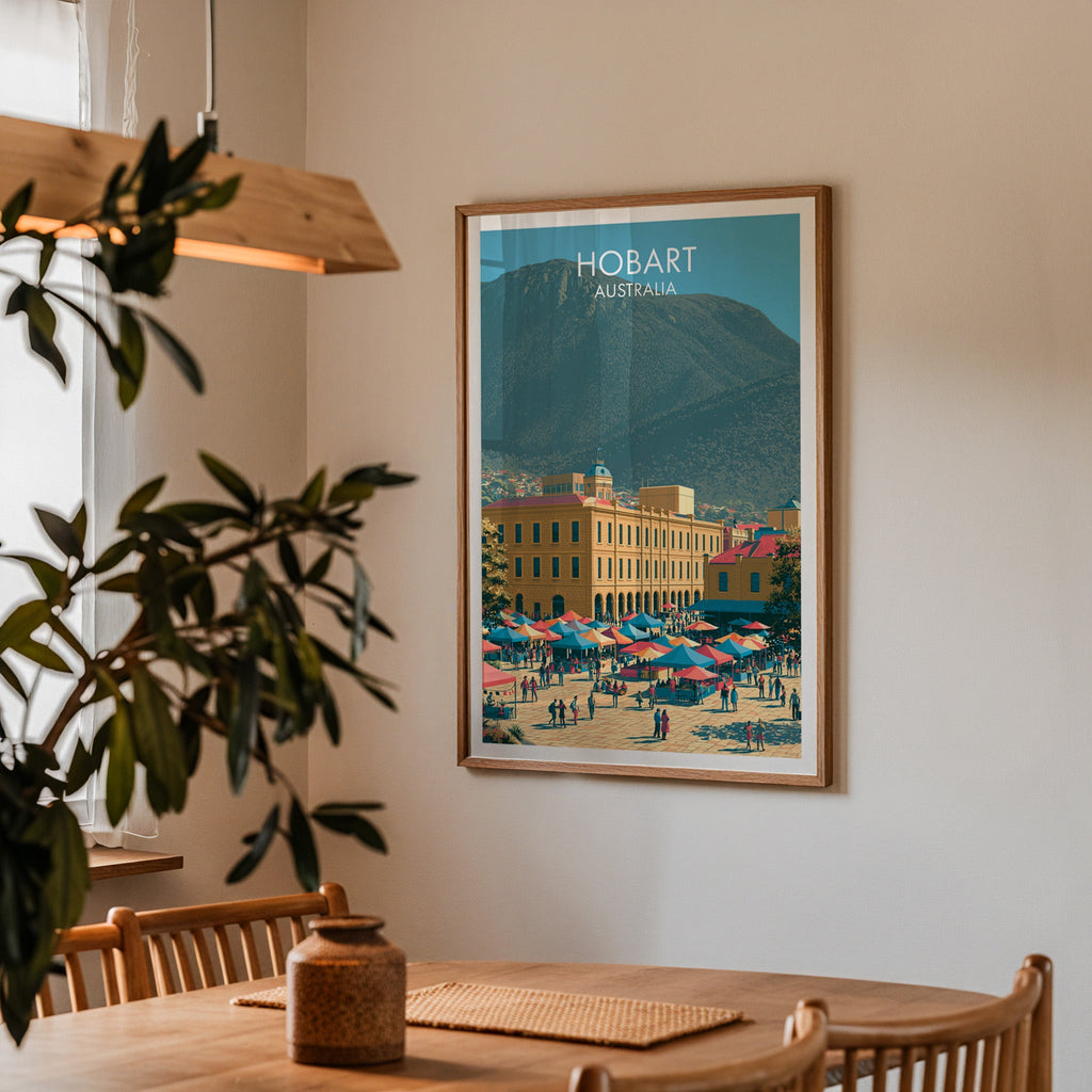 Hobart poster in an oak frame in a dining corner with an oak table, spindle chairs and pendant light