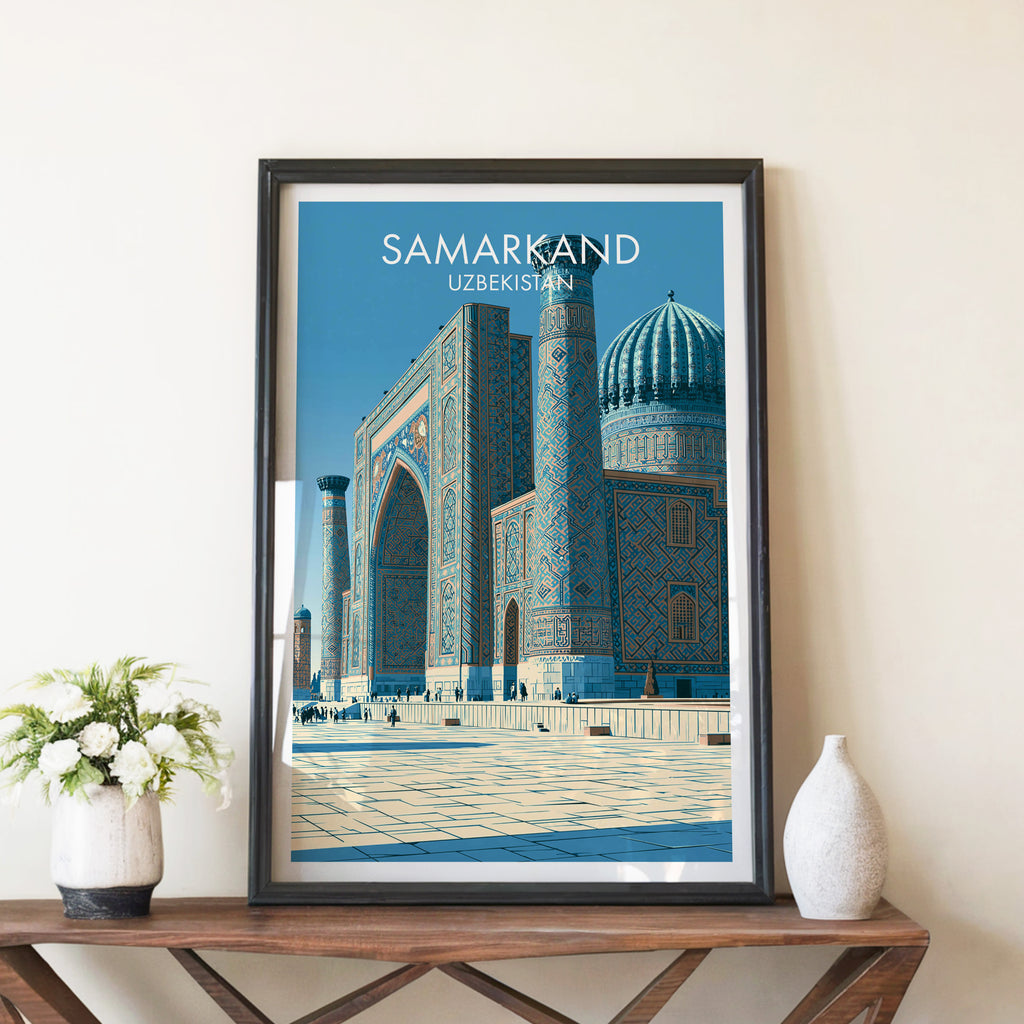 Samarkand Uzbekistan travel poster in a black frame on a wooden console table with white flowers