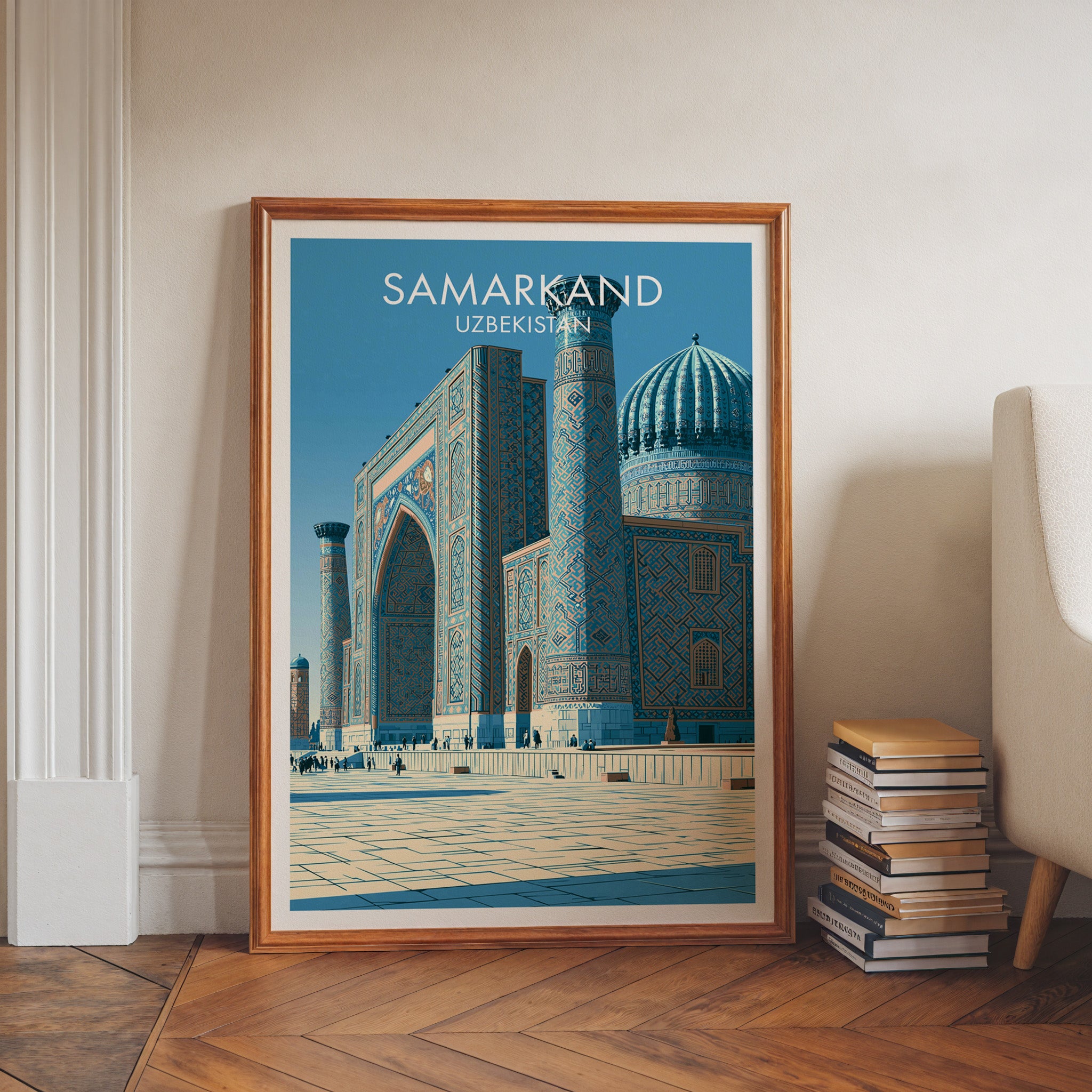 Samarkand Uzbekistan art print in a walnut frame leaning in a hallway beside stacked books