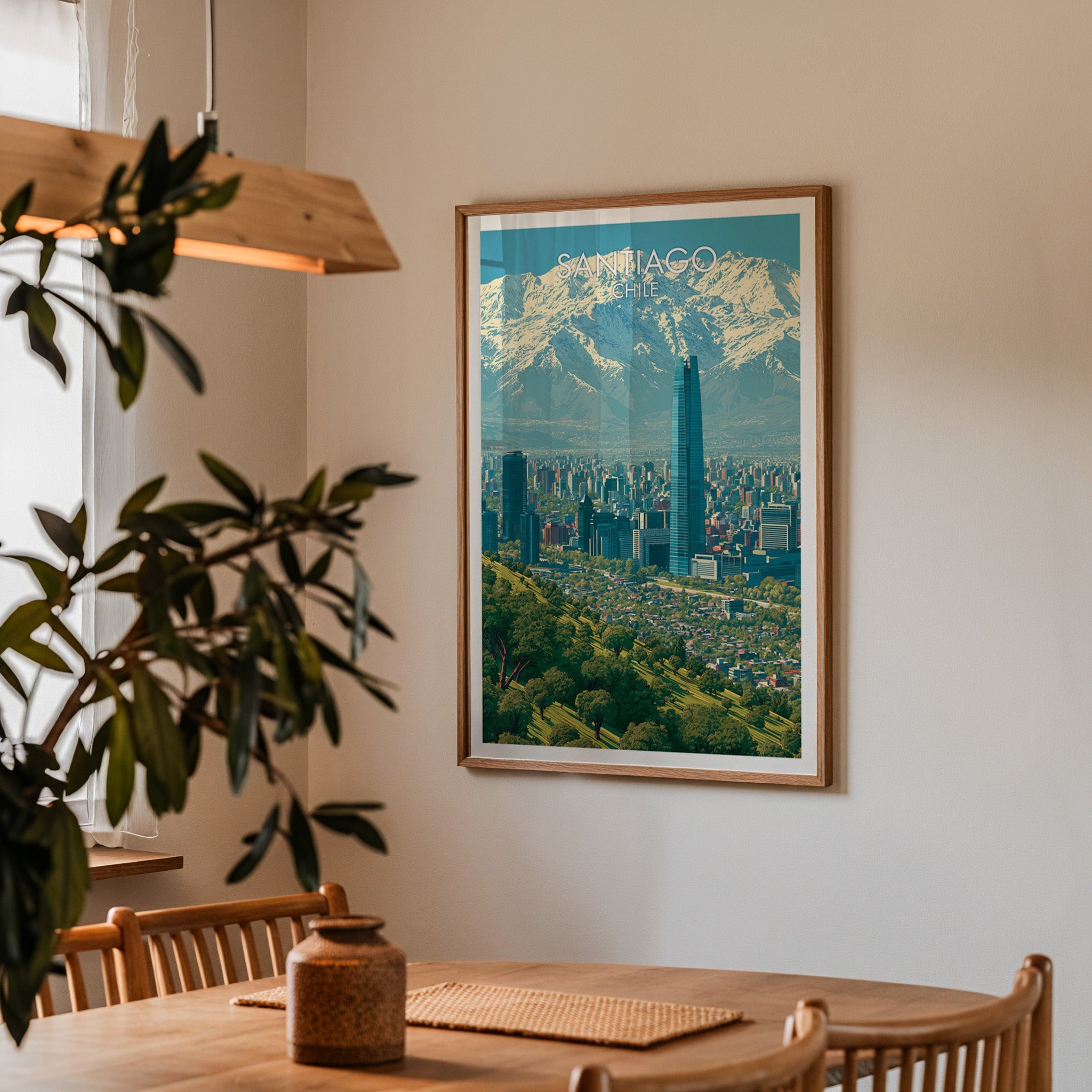 Santiago Chile wall art in an oak frame in a dining corner with a wood table, cane chairs and a wood pendant lamp