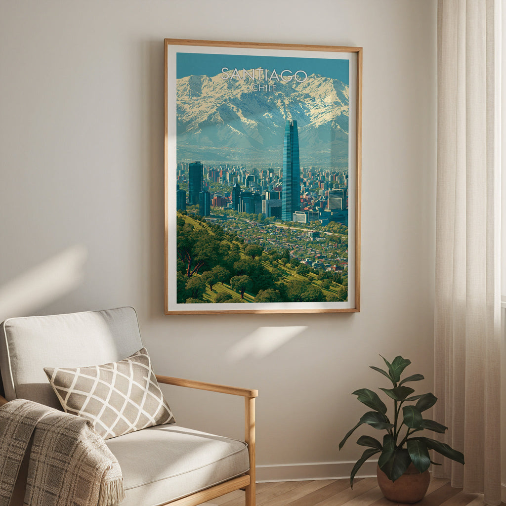Santiago valley poster in an oak frame above a cream armchair with checked cushion, sheer curtains and a rubber plant