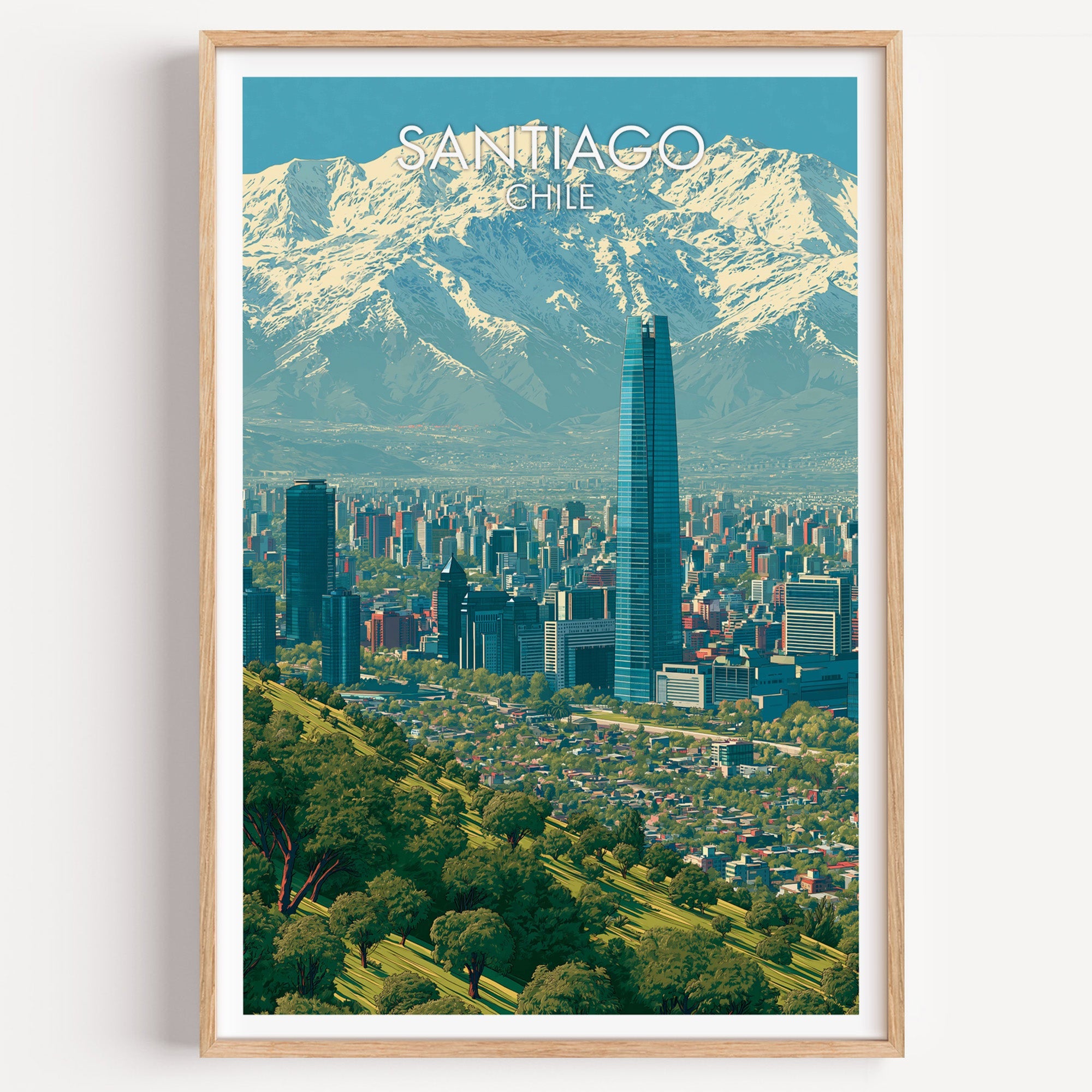 Santiago Chile travel poster of the snowcapped Andes above the city, in a light oak frame on a plain white wall