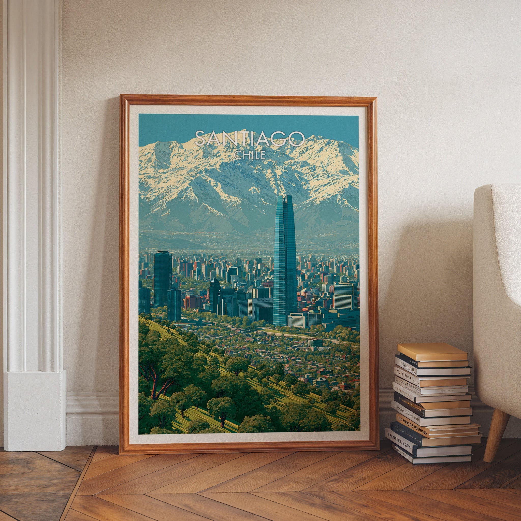 Santiago glass tower print in a walnut frame on herringbone floor by white moulding, book stacks and a cream armchair