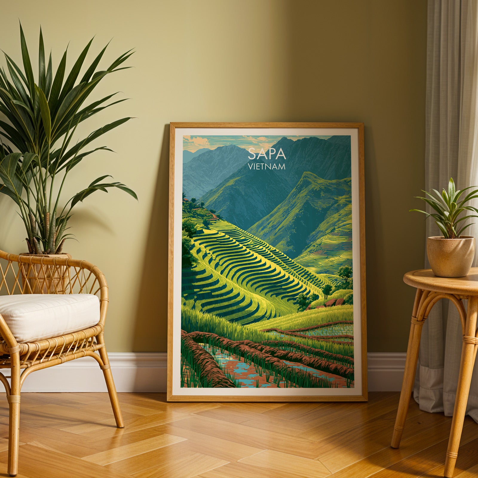 Large Sapa Vietnam travel print in an oak frame leaning on a herringbone floor next to a rattan chair