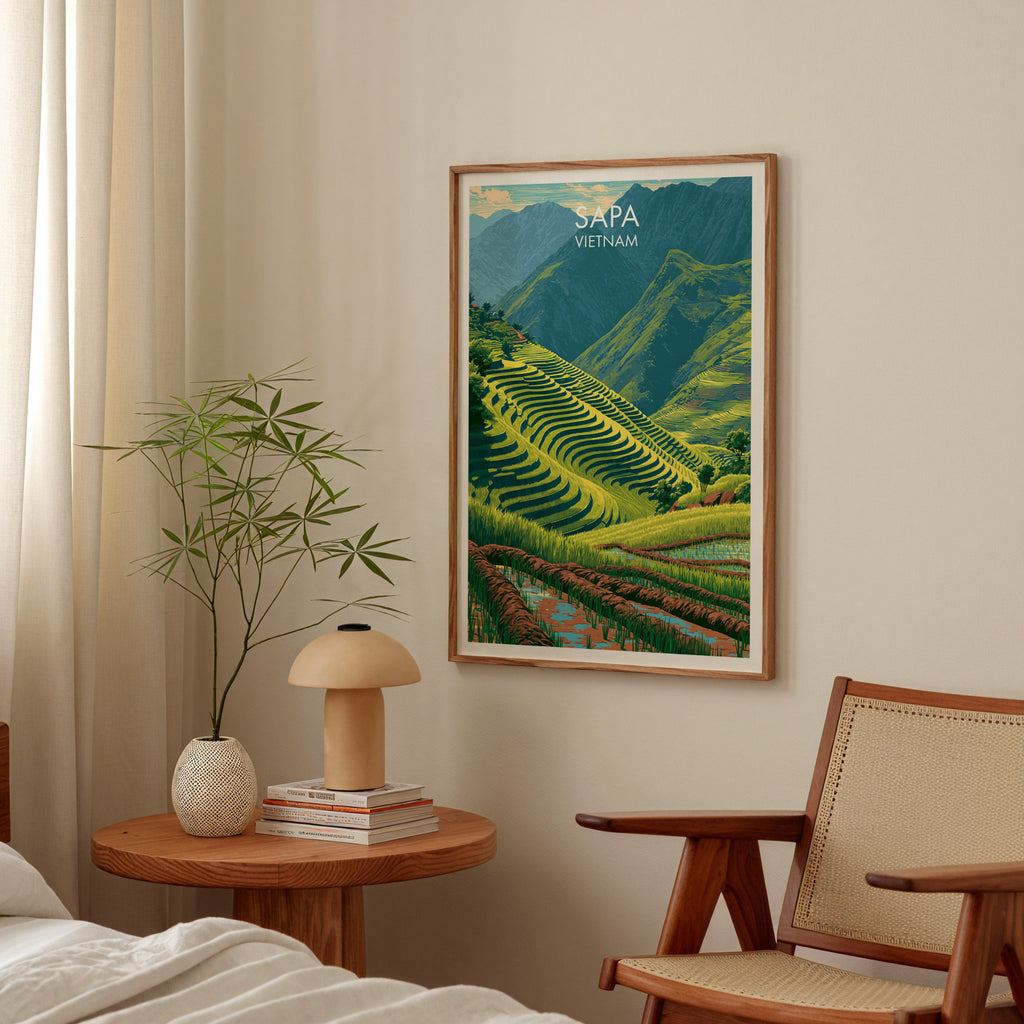 Sapa Vietnam poster above a bedroom nightstand with a bamboo plant and mushroom lamp