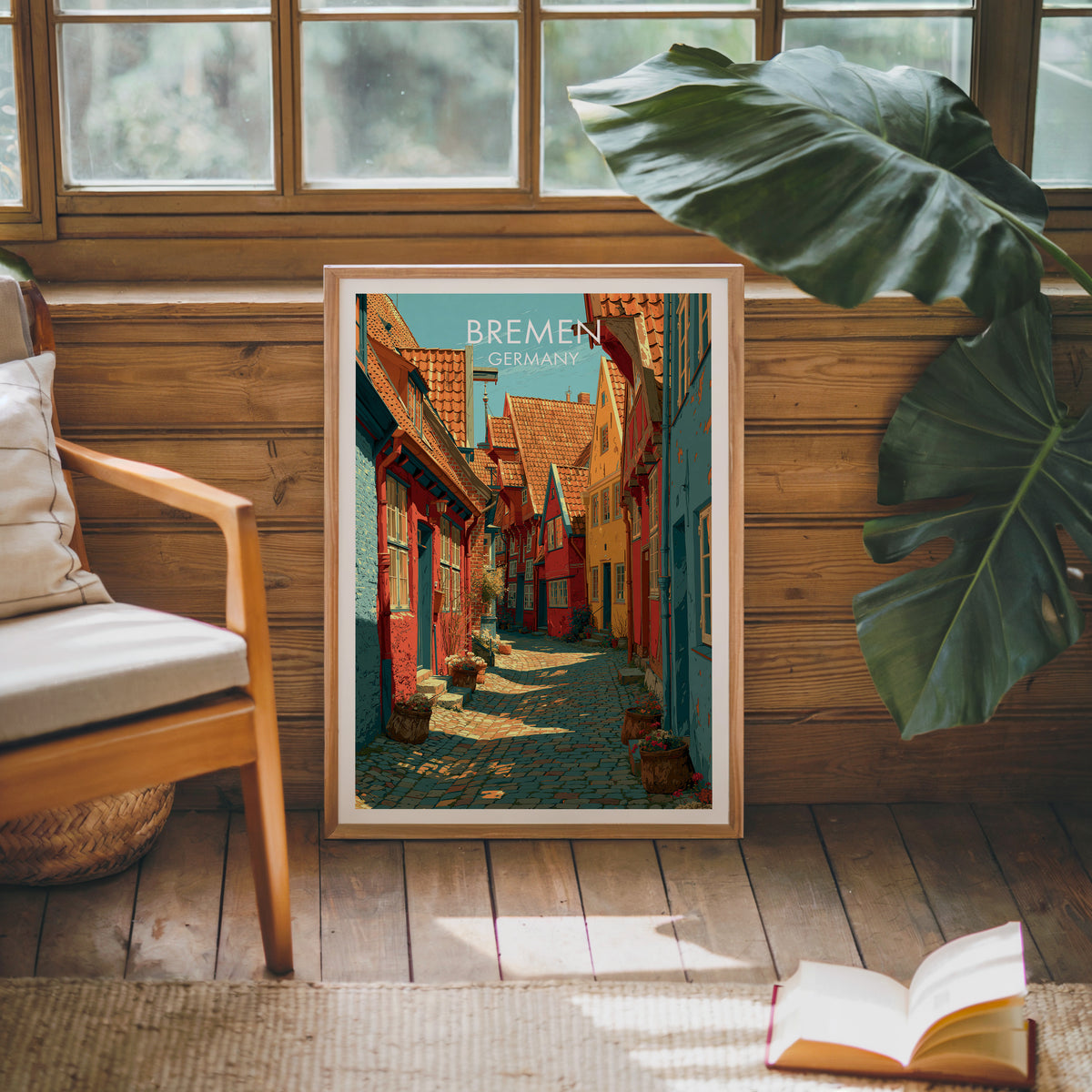 Schnoor Quarter Bremen poster, oak frame leaning on a wood-panelled sunroom wall by a mid-century armchair