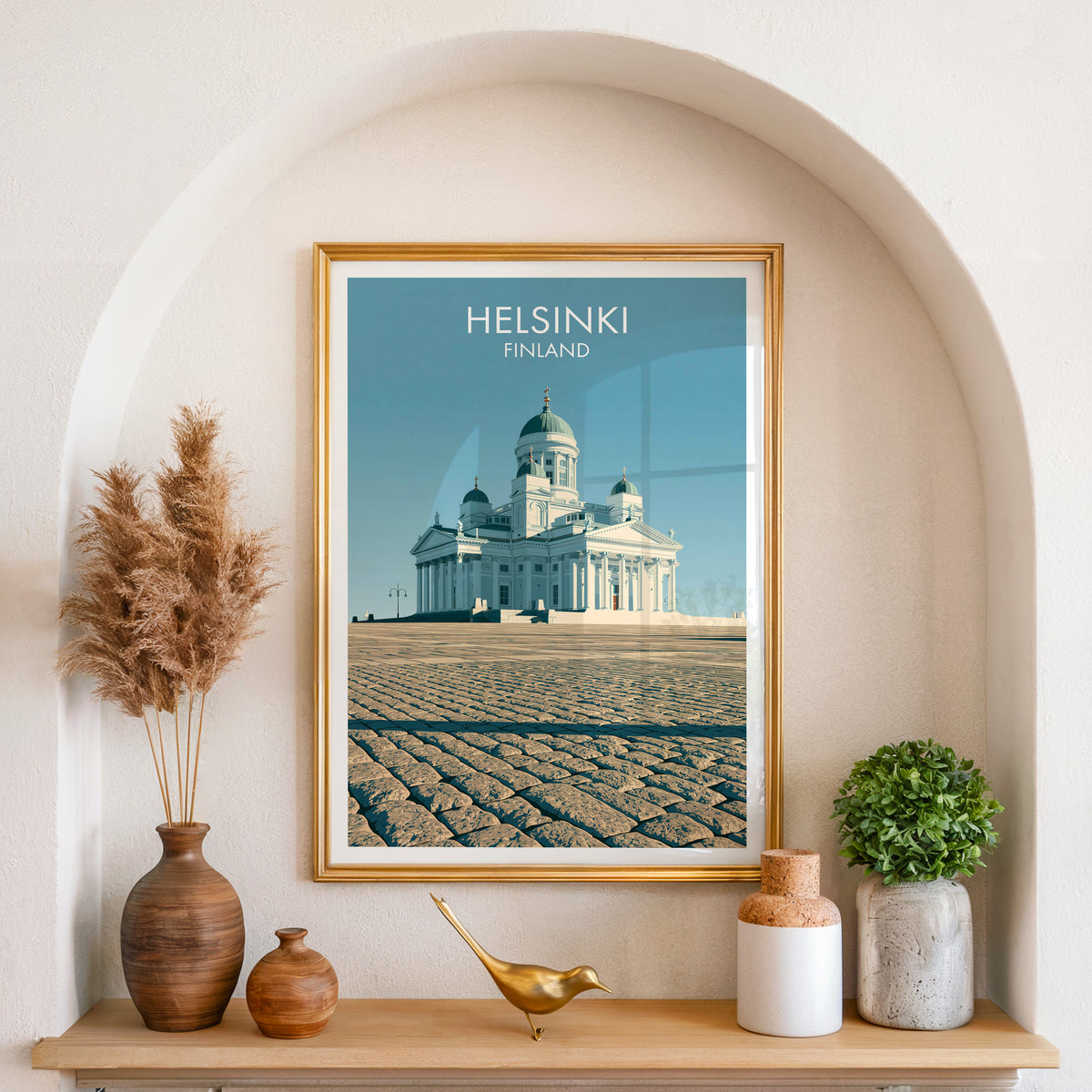 Senate Square Helsinki wall art, gold frame in an arched wall niche above pampas grass in a clay vase