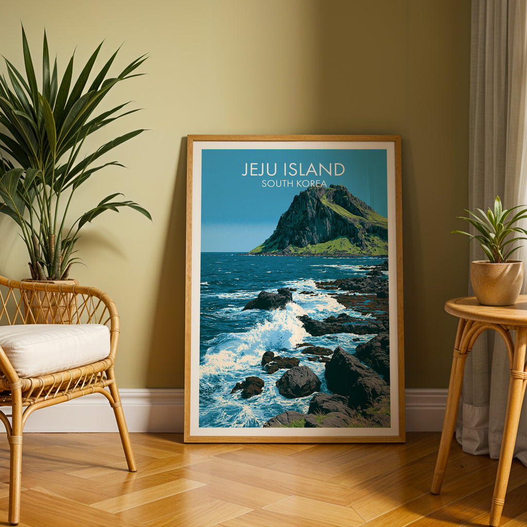 Large Seongsan Ilchulbong Jeju Korea travel print in an oak frame leaning on a herringbone floor next to a rattan chair