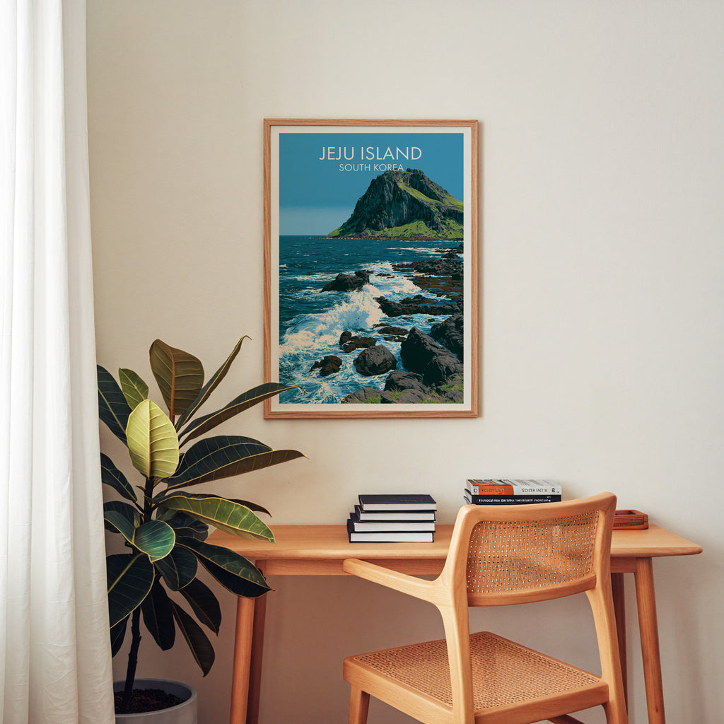 Seongsan Ilchulbong Jeju Korea wall art above a wooden home office desk with a rattan chair and books