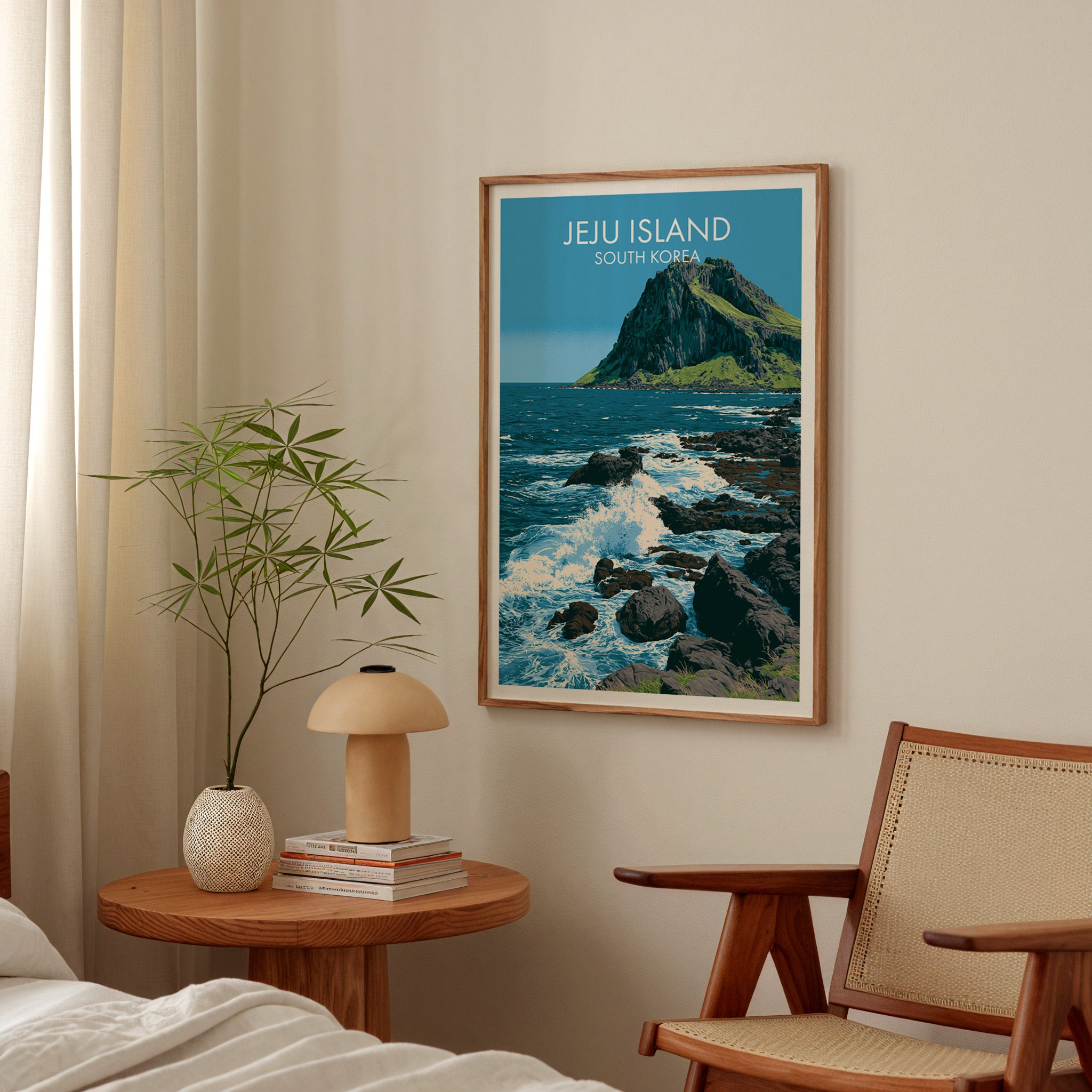 Seongsan Ilchulbong Jeju Korea poster above a bedroom nightstand with a bamboo plant and mushroom lamp