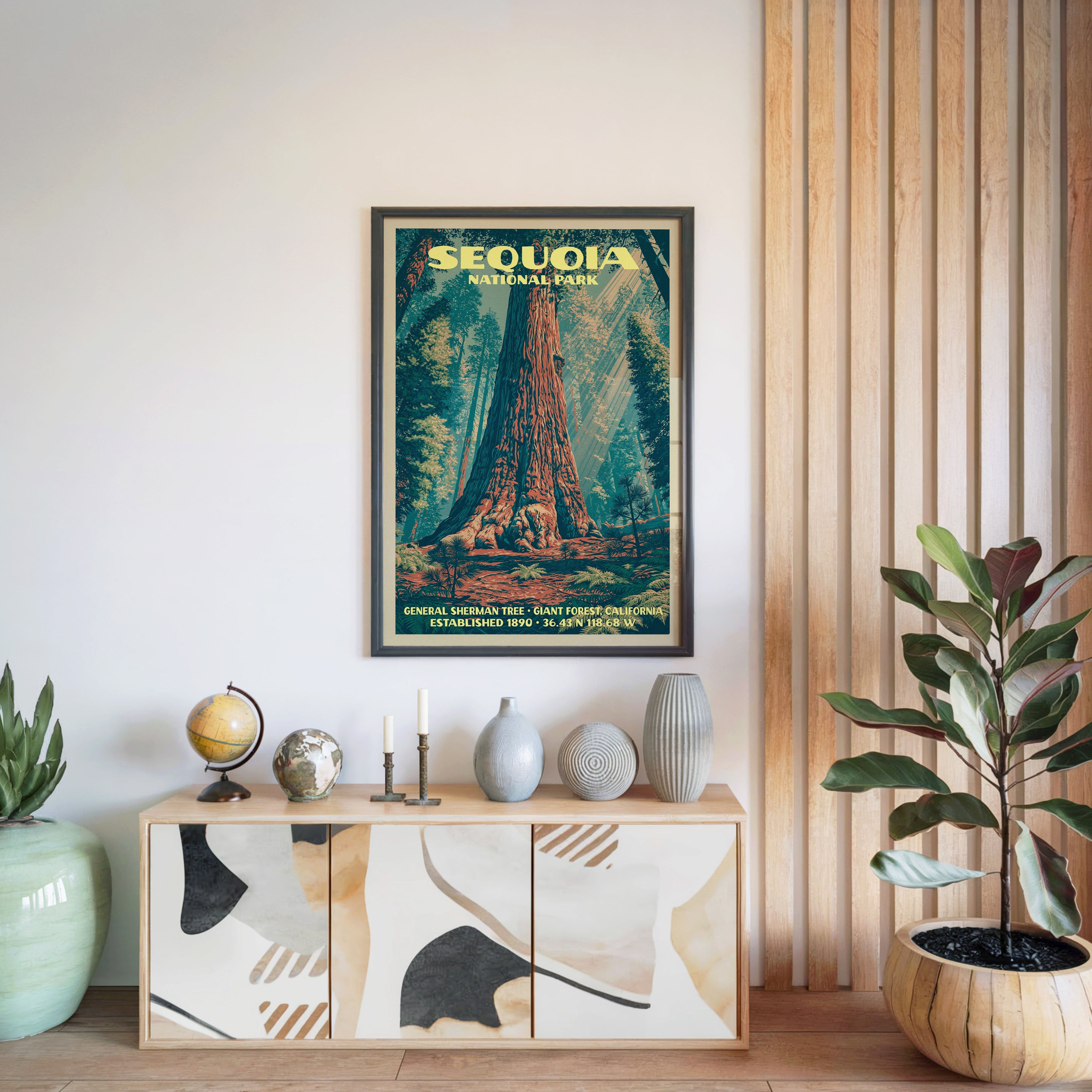 Sequoia National Park print in a black frame above a light wood sideboard by a slatted wall panel