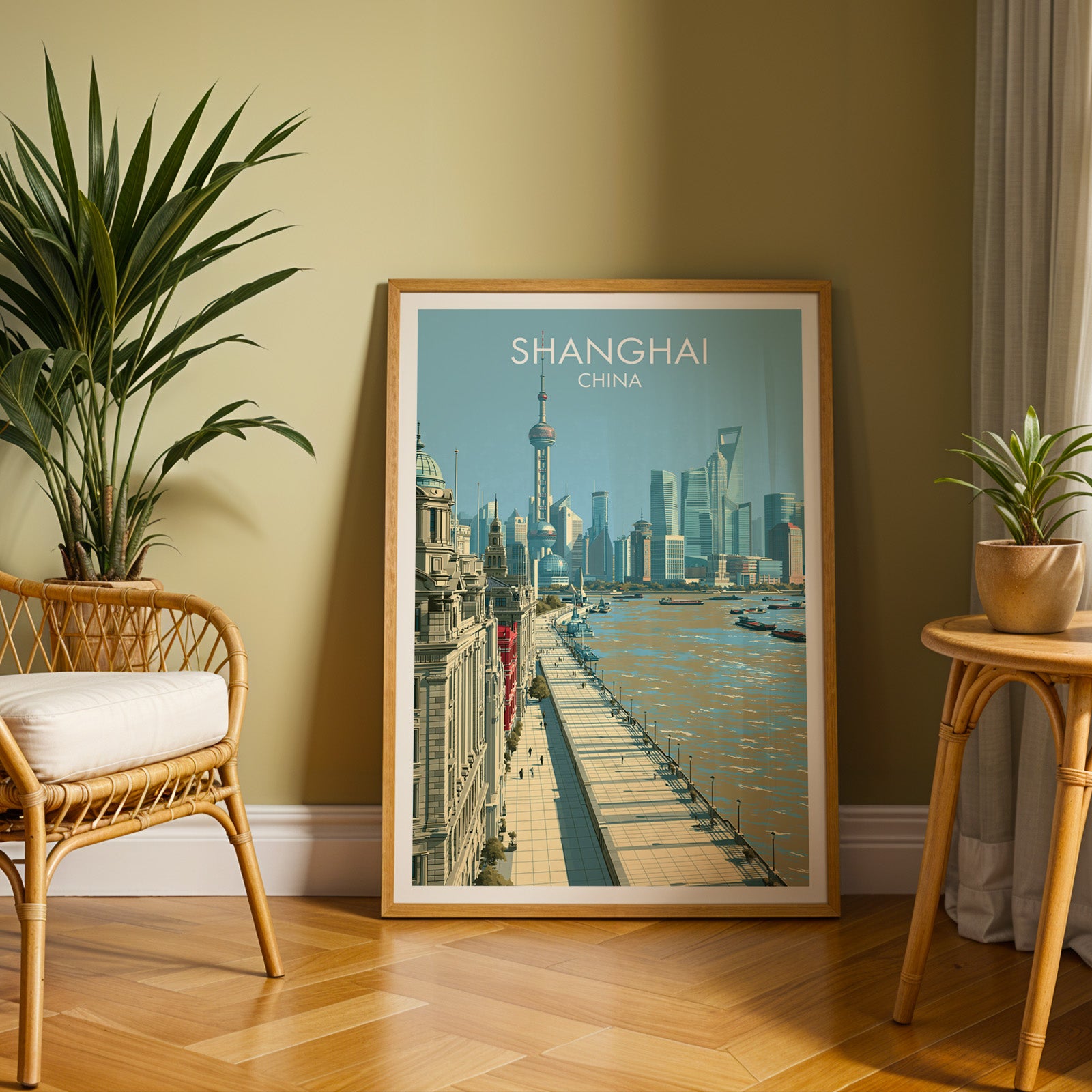 Large Shanghai China travel print in an oak frame leaning on a herringbone floor next to a rattan chair