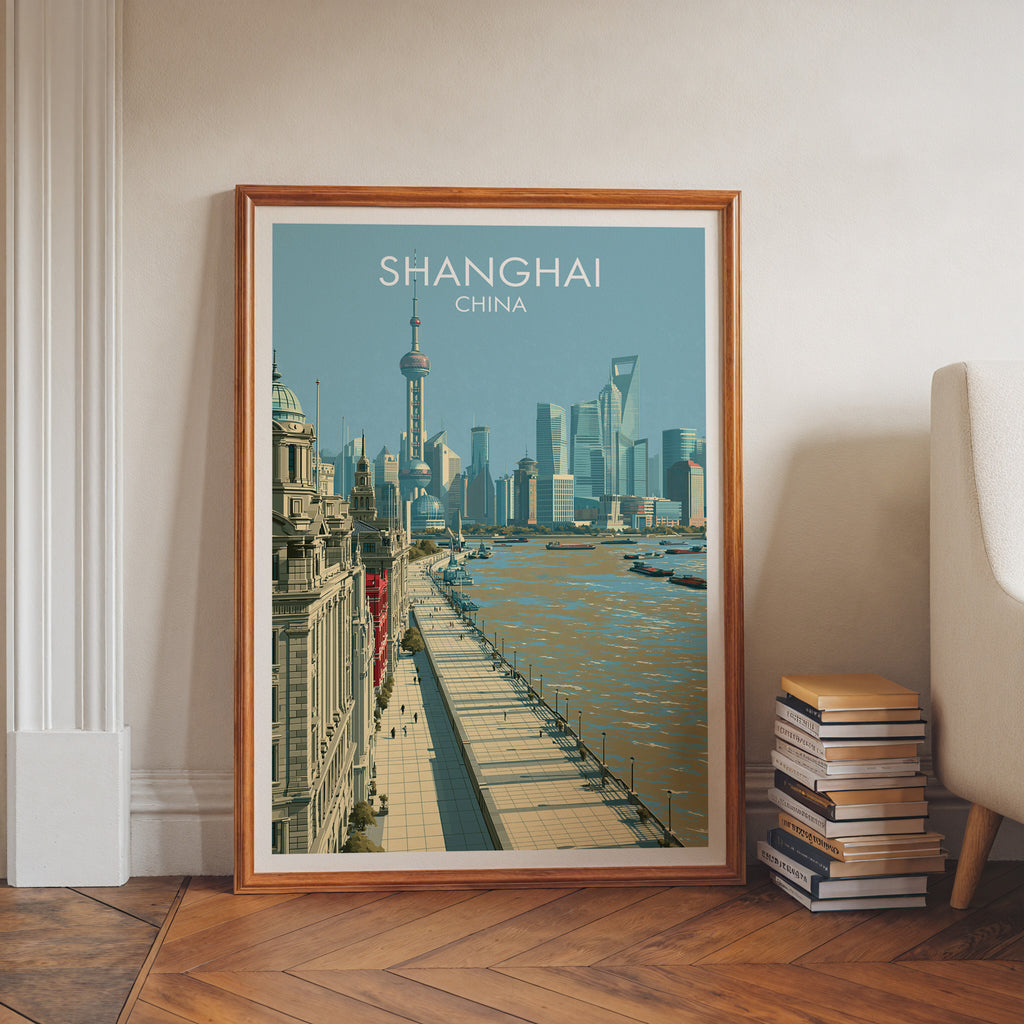 Shanghai China art print in a walnut frame leaning in a hallway beside stacked books