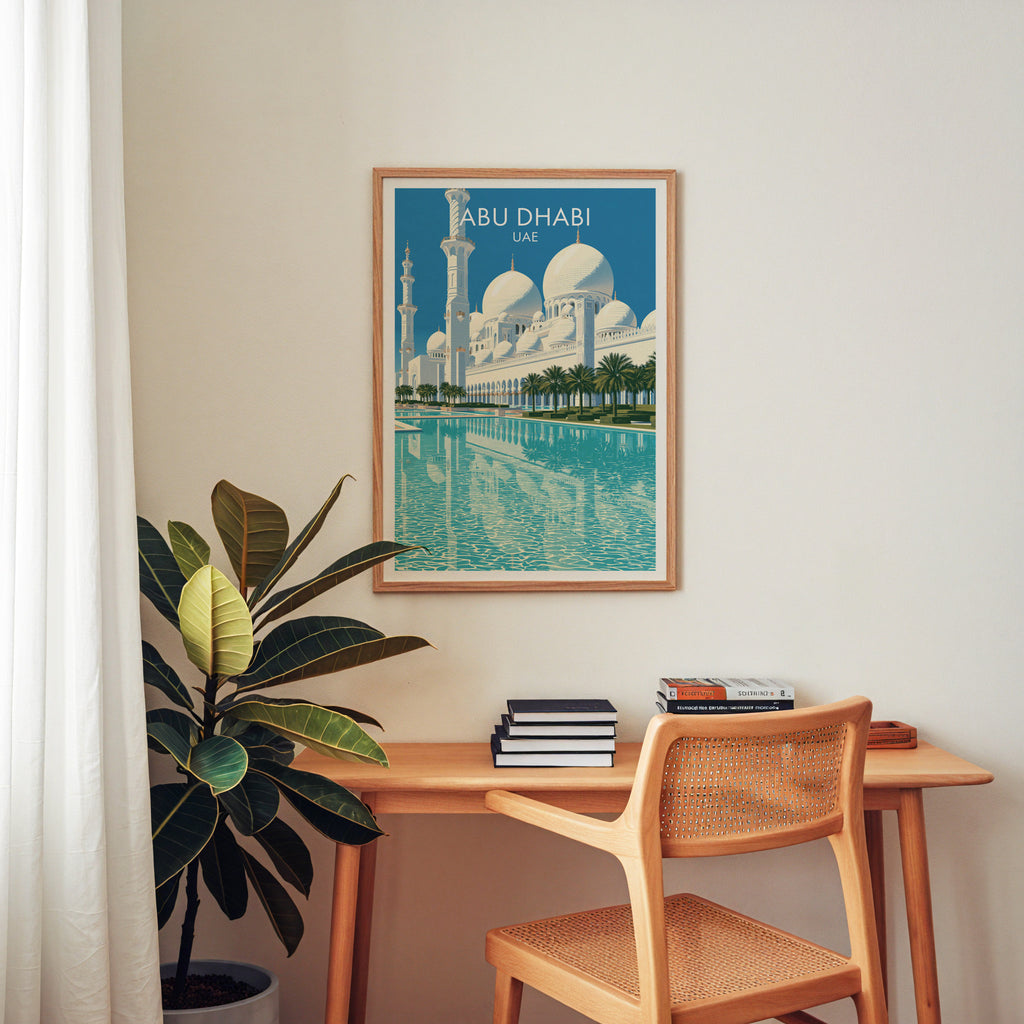 Sheikh Zayed Mosque Abu Dhabi wall art above a wooden home office desk with a rattan chair and books