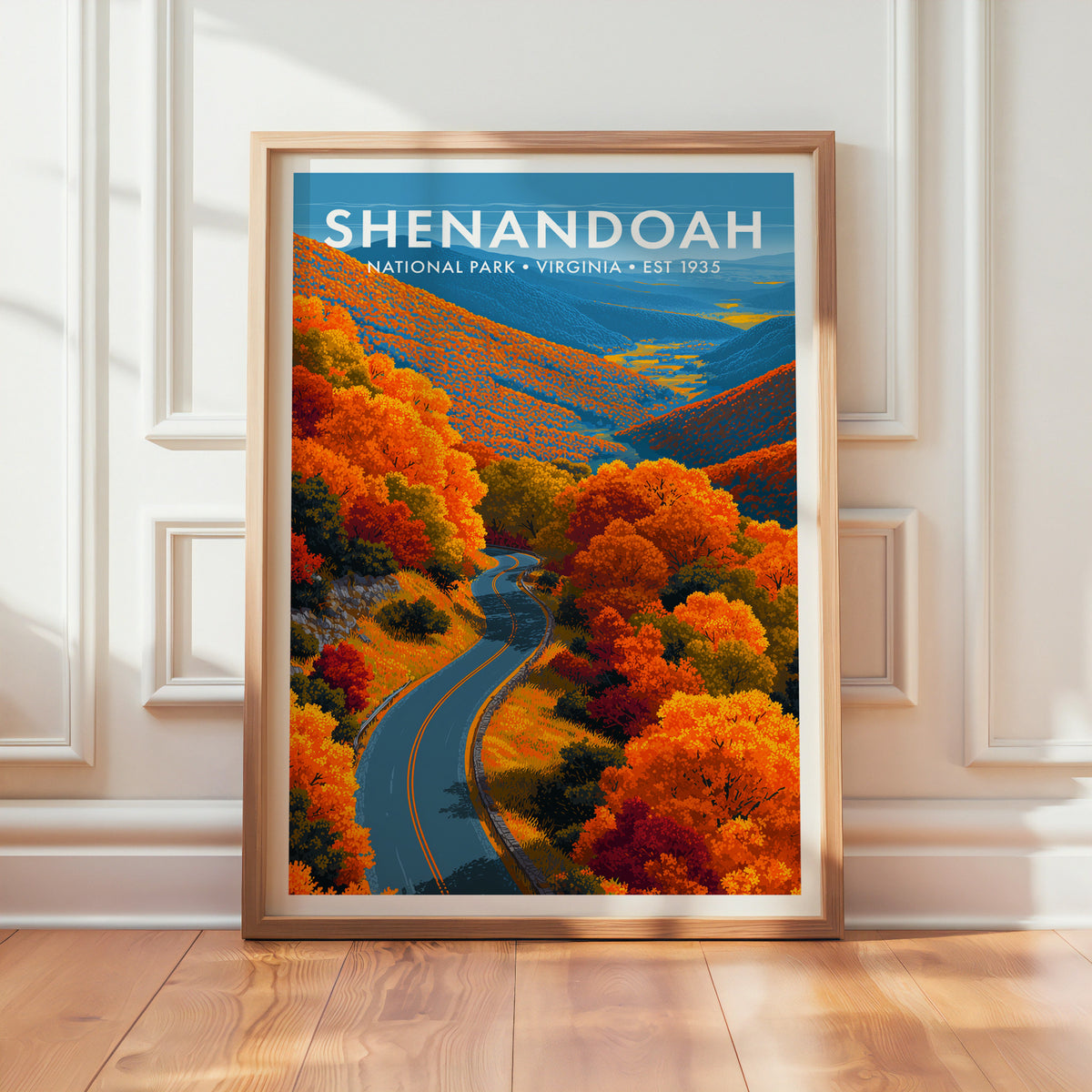 Shenandoah National Park mid-century modern art print in a light oak frame leaning against a panelled white wall on a wood floor
