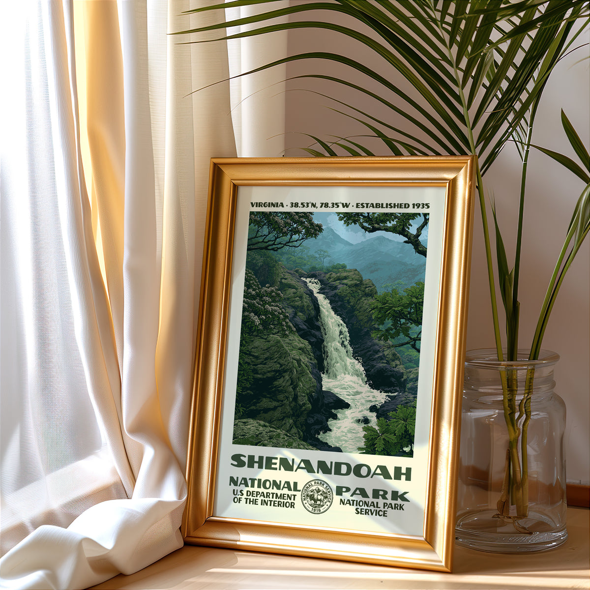 Shenandoah National Park vintage poster in a gold frame beside a linen curtain and potted palm