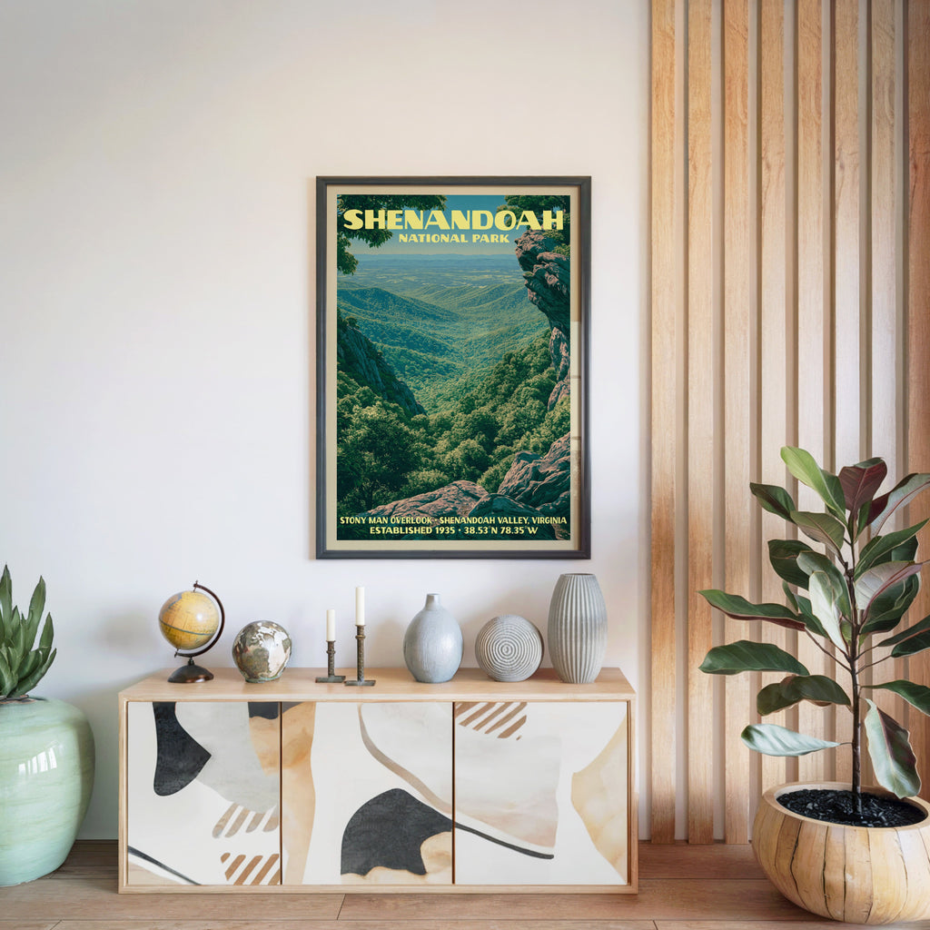 Shenandoah National Park print in a black frame above a light wood sideboard by a slatted wall panel