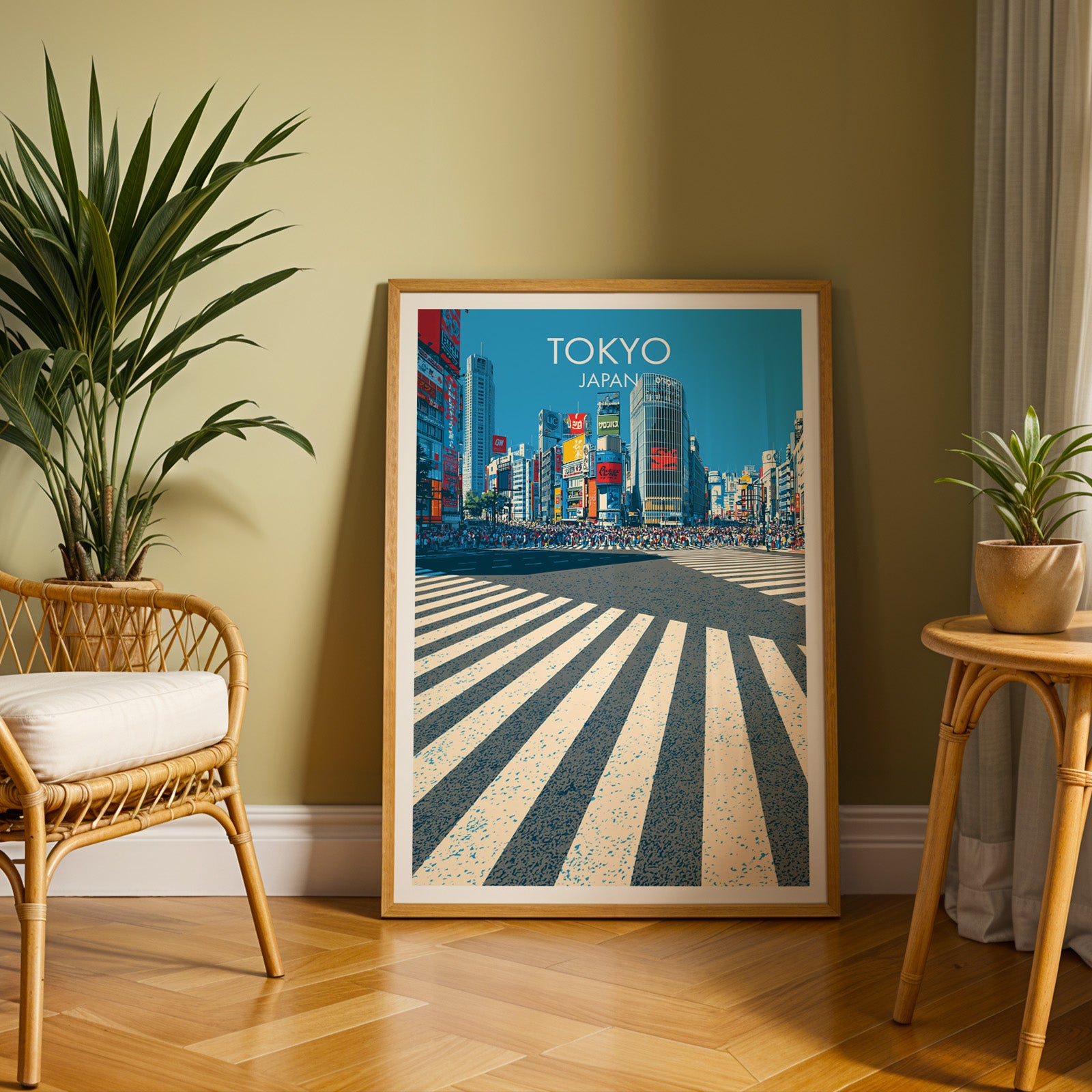 Large Shibuya Crossing Tokyo Japan travel print in an oak frame leaning on a herringbone floor next to a rattan chair