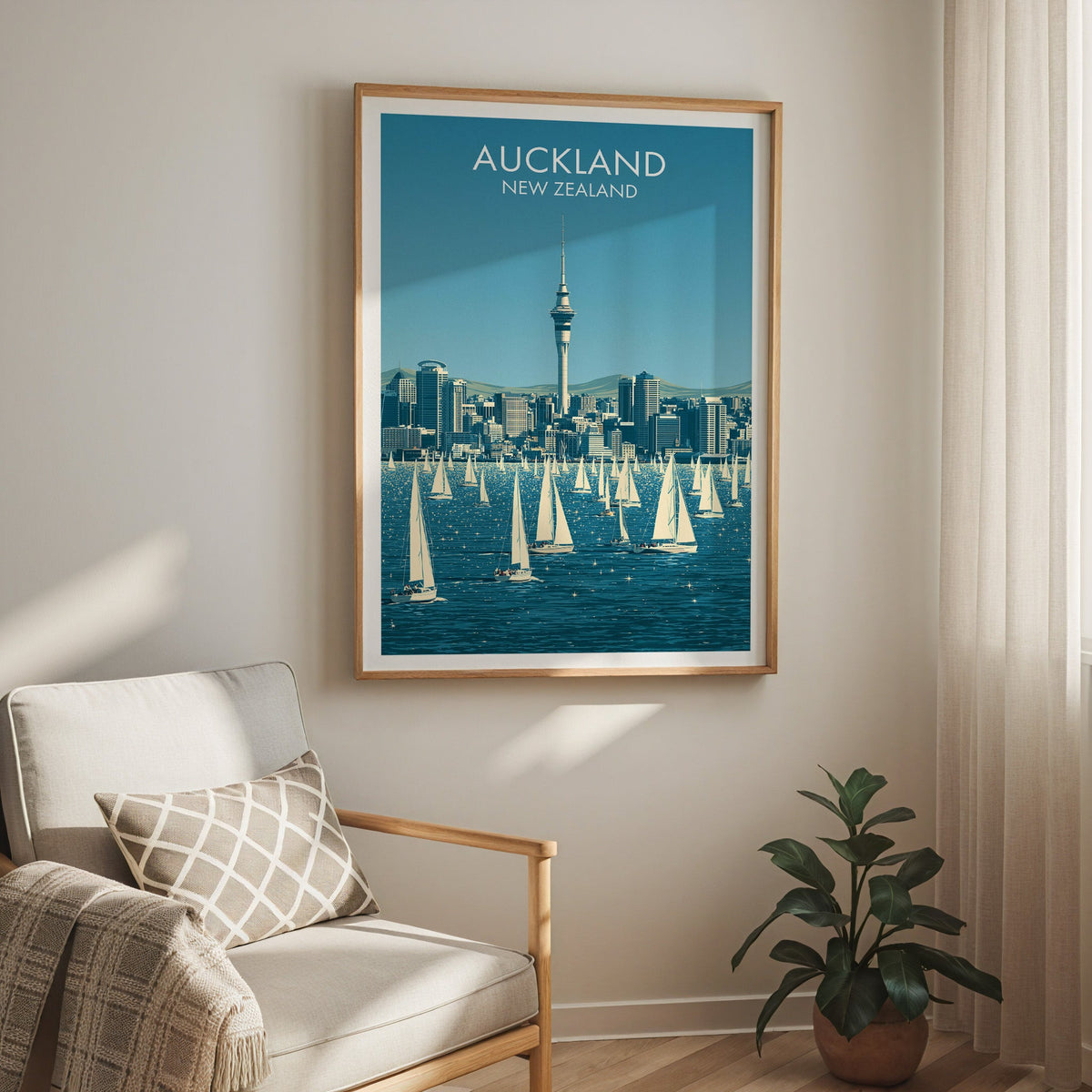 Sailboat harbour poster above a cream armchair with a sheer curtain and rubber plant in terracotta