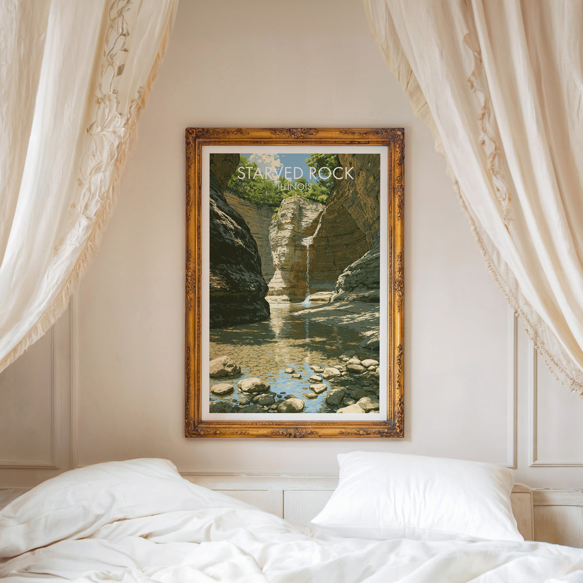 Starved Rock wall art in a carved gold frame above a white bed with a linen canopy