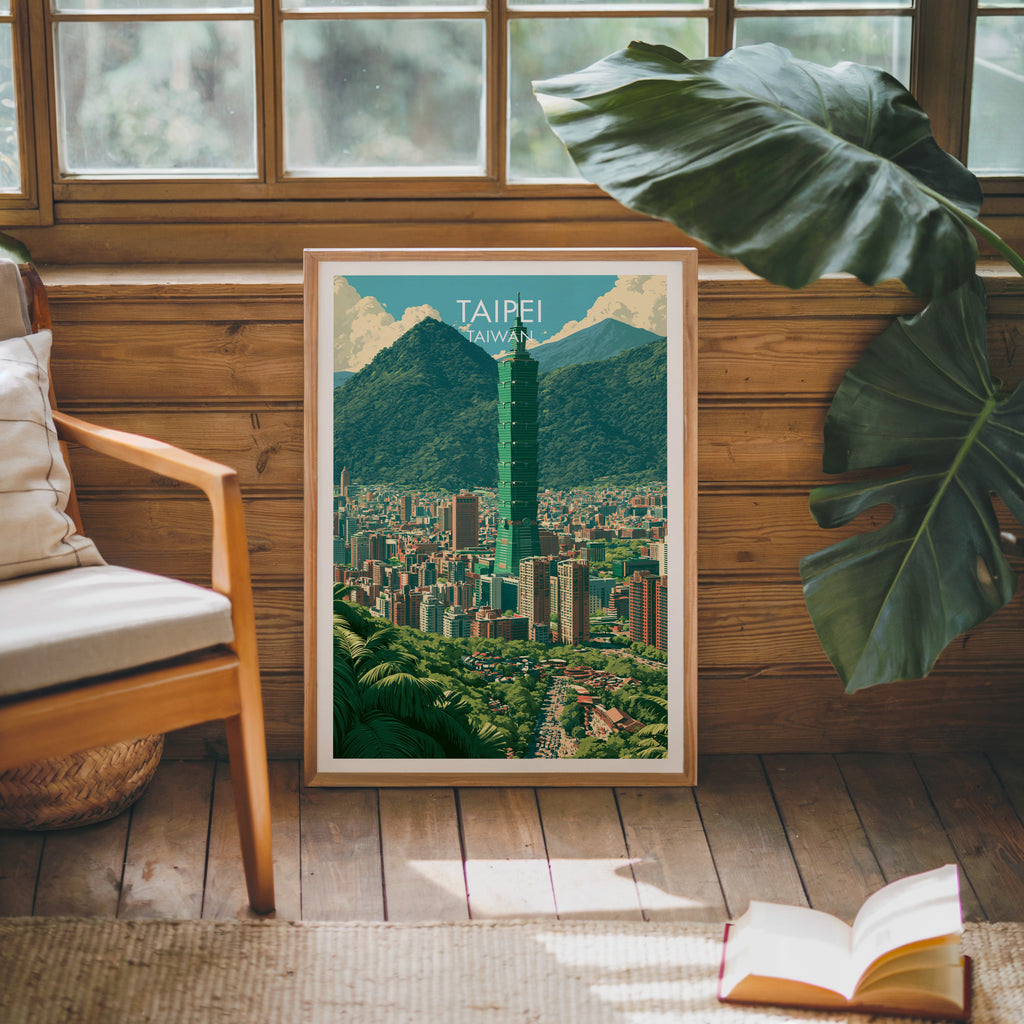 Framed Taipei Taiwan poster leaning against a timber cabin wall with monstera leaves and an open book